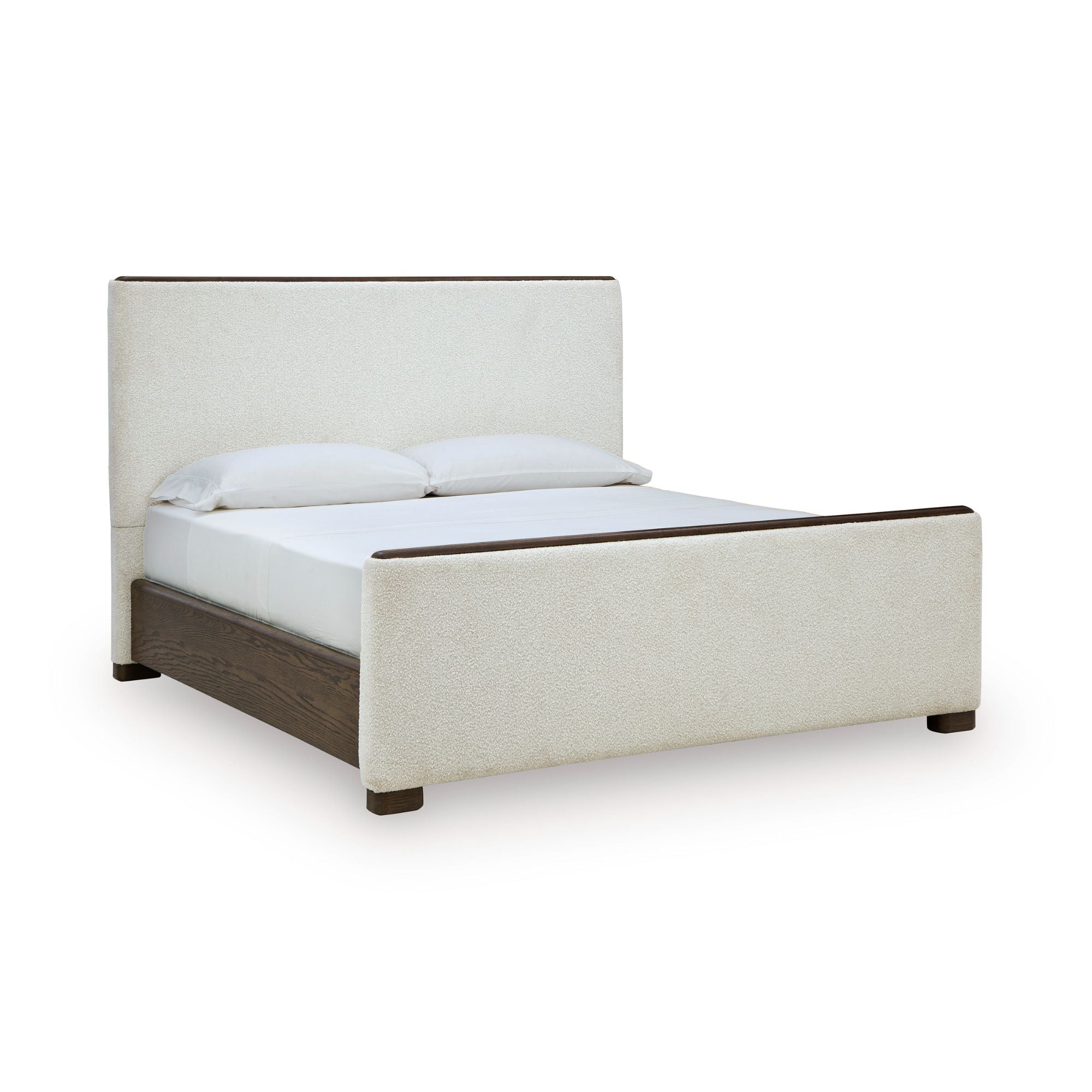 Upholstered panel bed from the Radkin bedroom collection by Signature Design Ashley, featuring a cushioned headboard and sleek design.