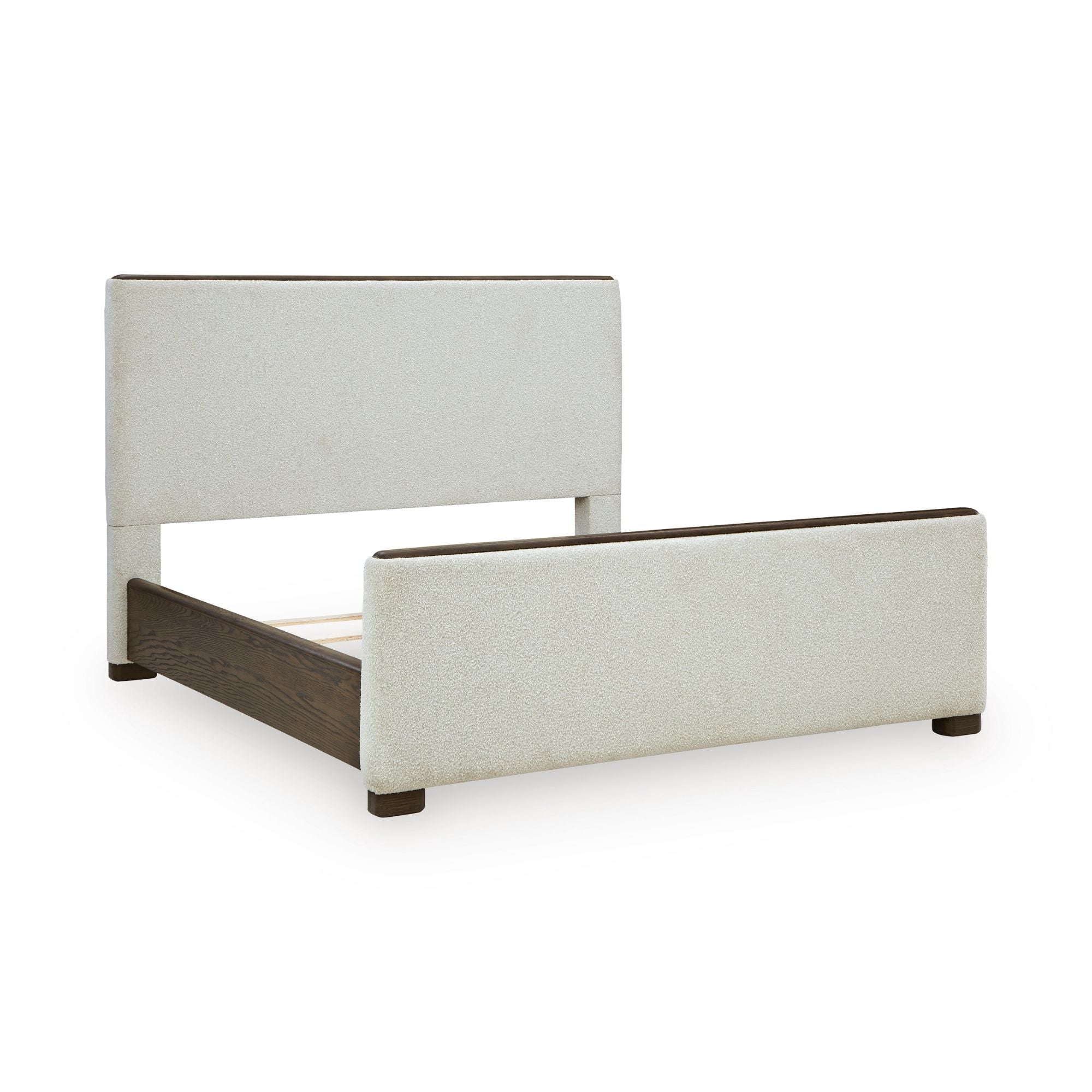 Upholstered panel bed from the Radkin bedroom collection by Signature Design, featuring a plush fabric headboard and modern design.