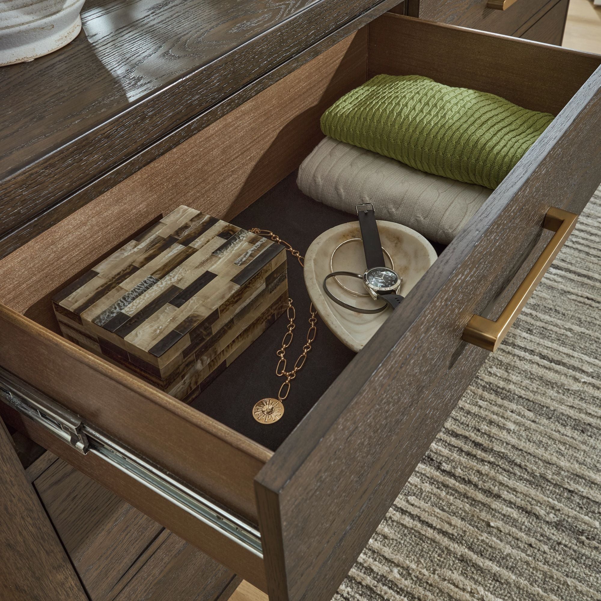 Radkin two-drawer nightstand from Signature Design by Ashley, featuring a modern bedroom storage solution with sleek drawers.