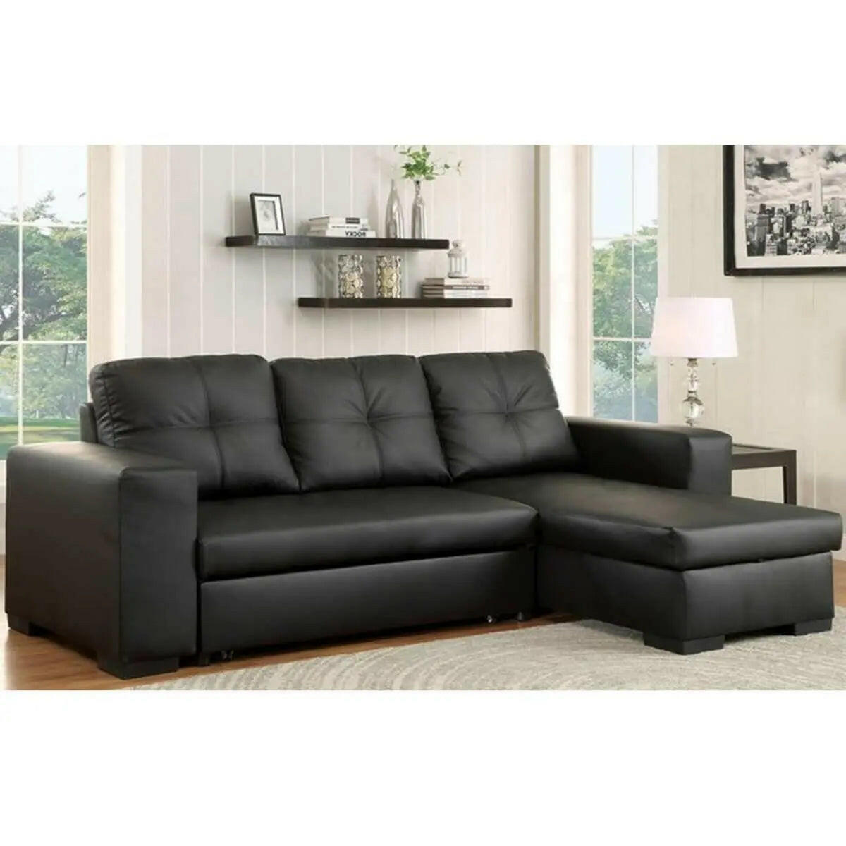 Black PU reversible sectional sleeper with storage chaise by IFF, showing the sofa bed and plush upholstery.