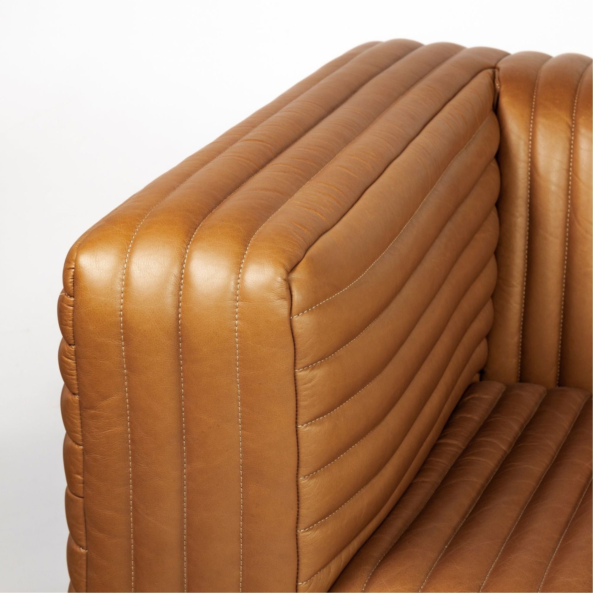 Mercana Ricciardo 82.5-inch cognac leather three-seater sofa with plush cushions and modern design