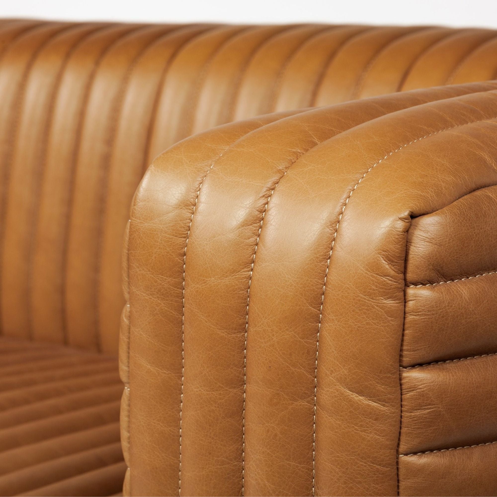 Mercana Ricciardo 82.5-inch cognac leather three-seater sofa with sleek modern design