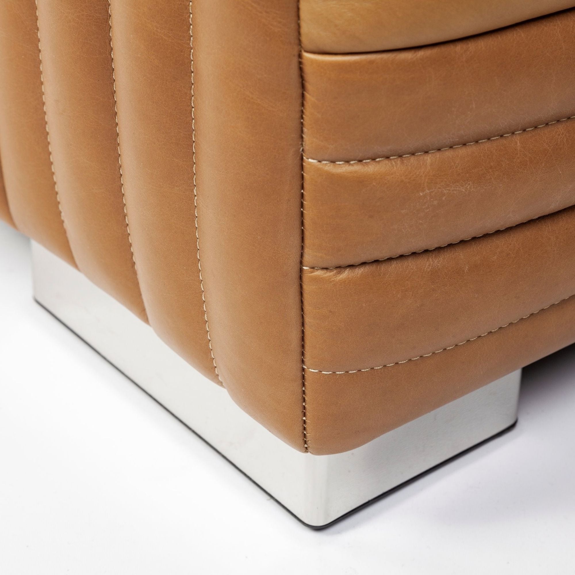Mercana Ricciardo 82.5-inch cognac leather three-seater sofa with a sleek, spacious design