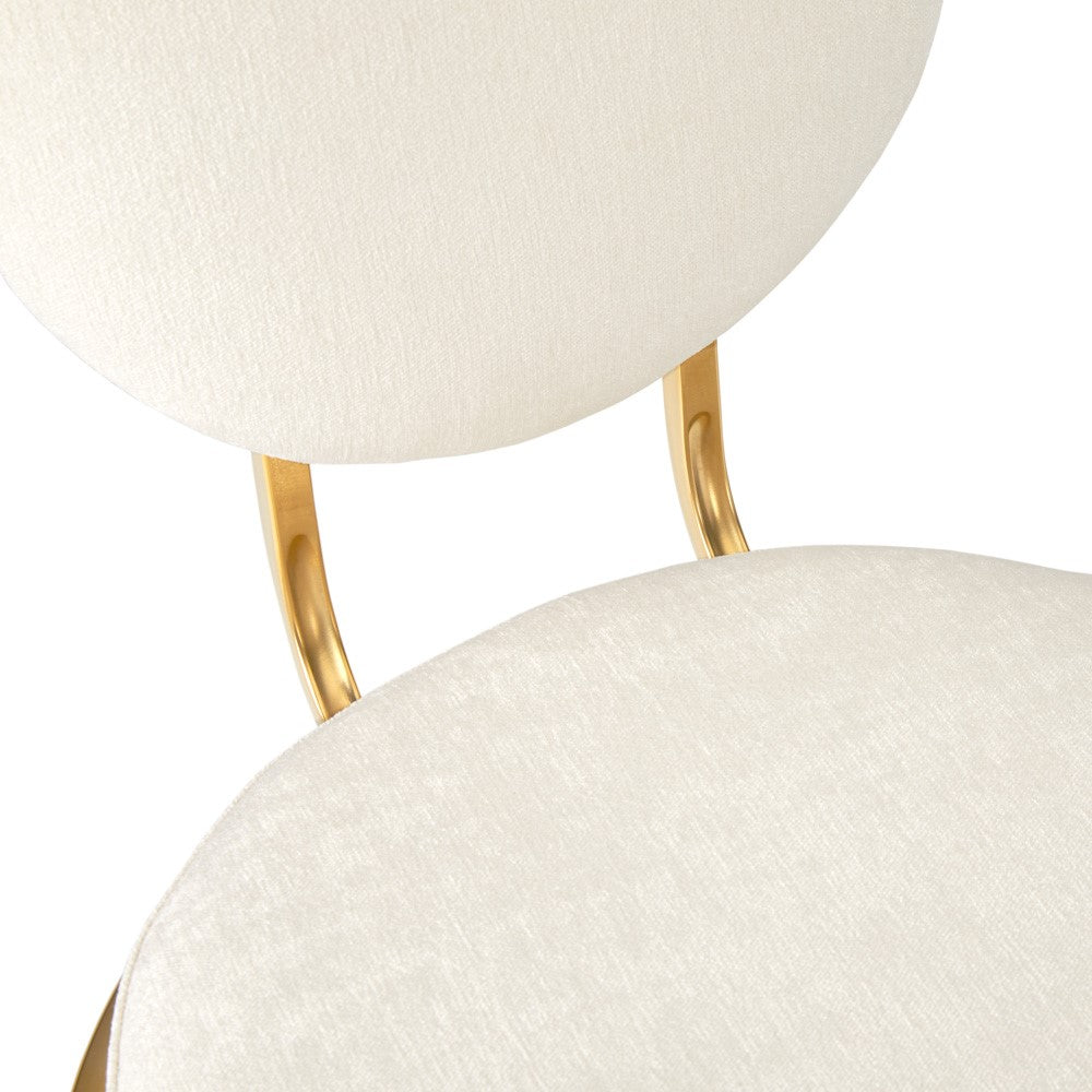 Xcella Rochelle gold counter stool with sleek design and upholstered seat, perfect for modern bar or kitchen settings.