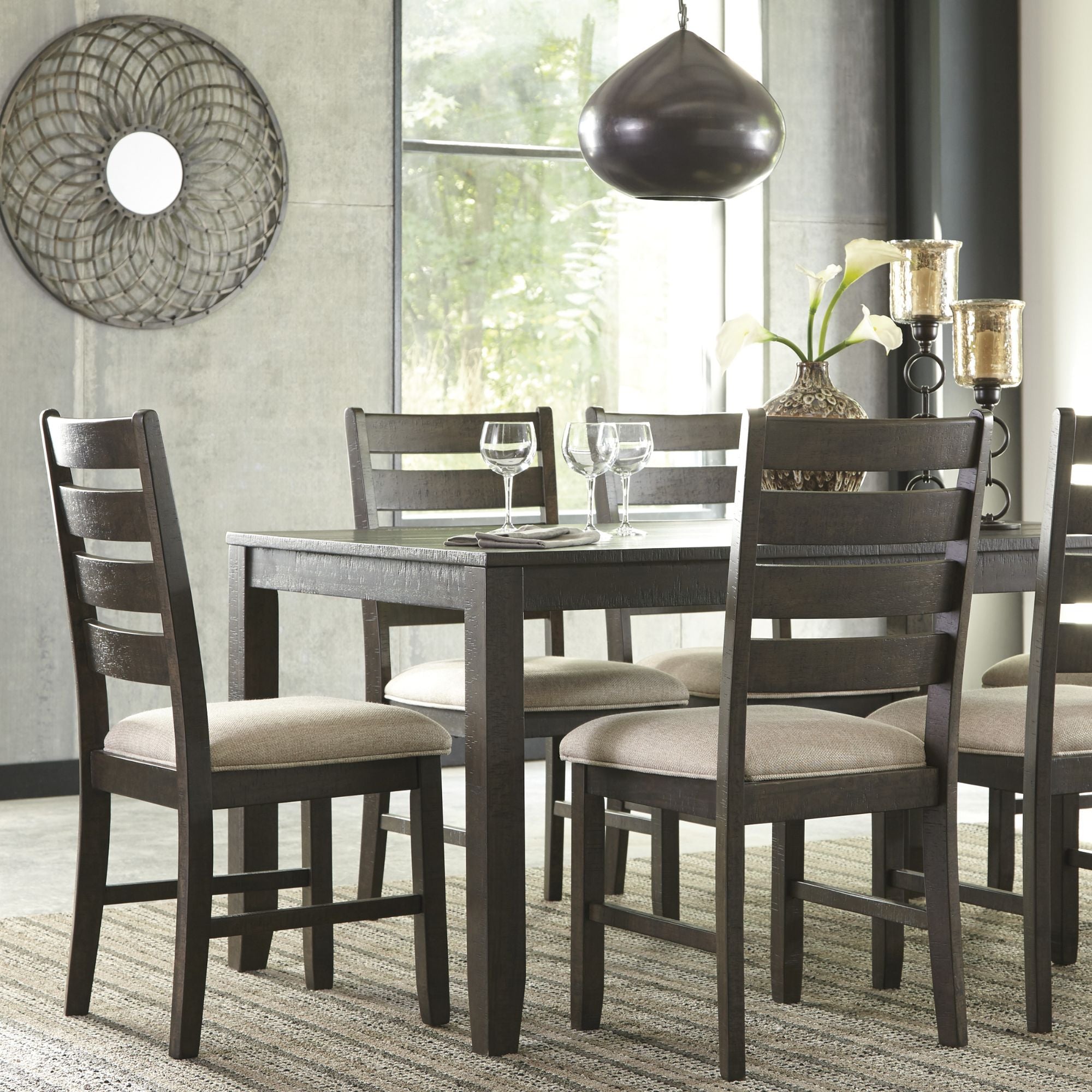 Seven-piece Rokane dining room table set by Signature Ashley, featuring a sleek table and matching chairs in a modern design.