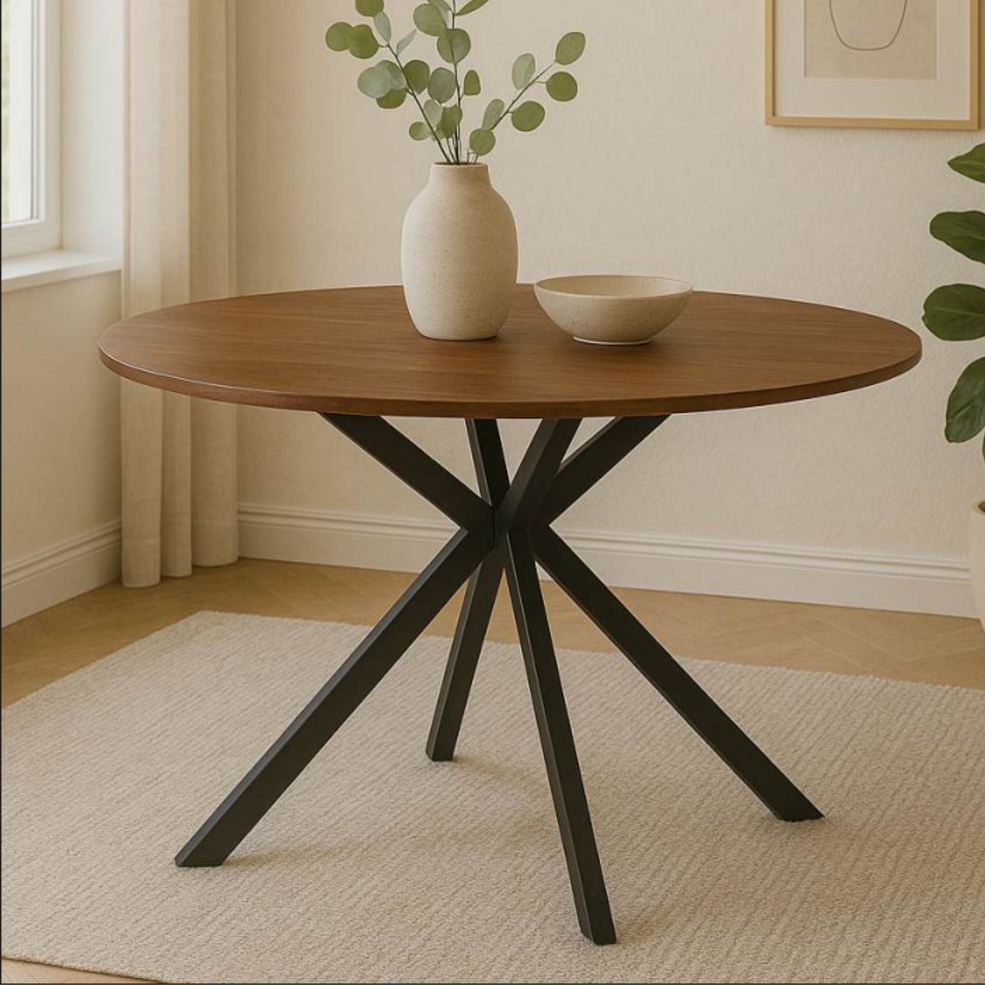 Xcella Frances wood dining table with round walnut veneer surface and sleek modern design.