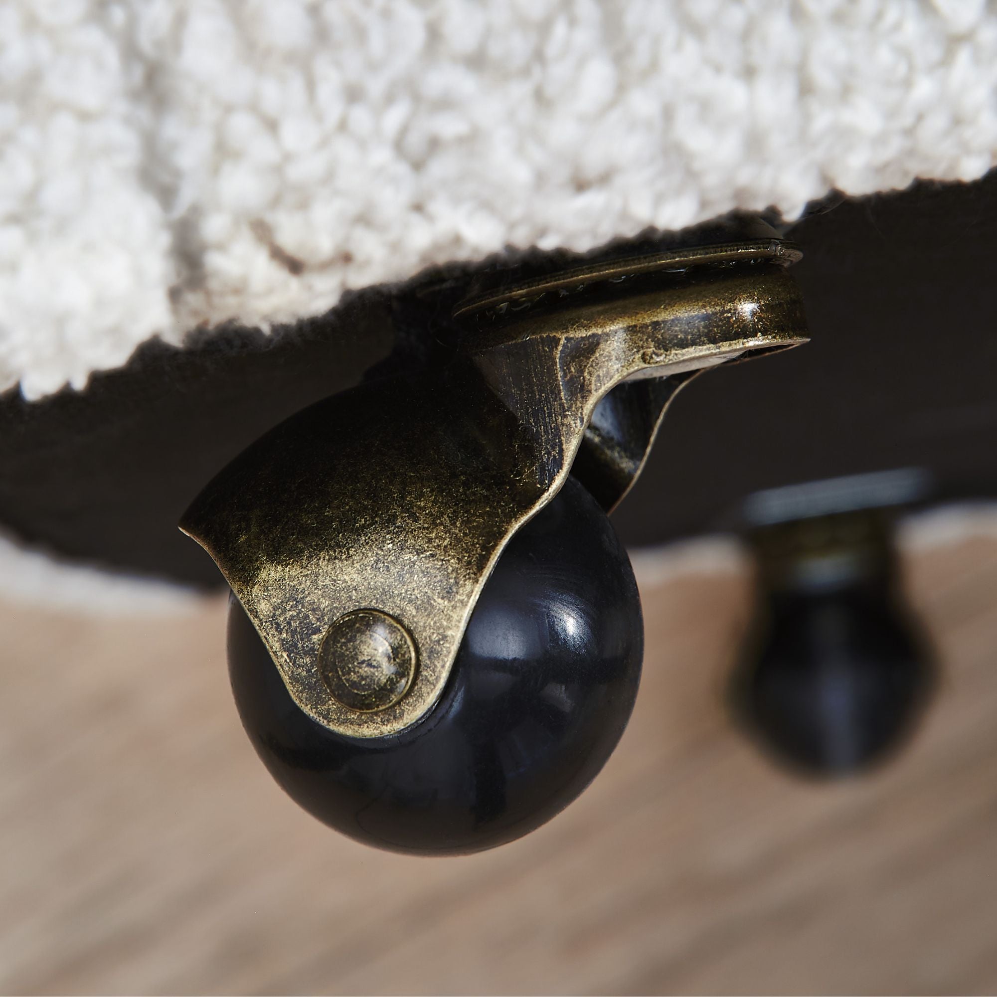 Ashley Rowanbeck 7-piece dining set with side and arm chairs, featuring a wooden table and upholstered chair seats.