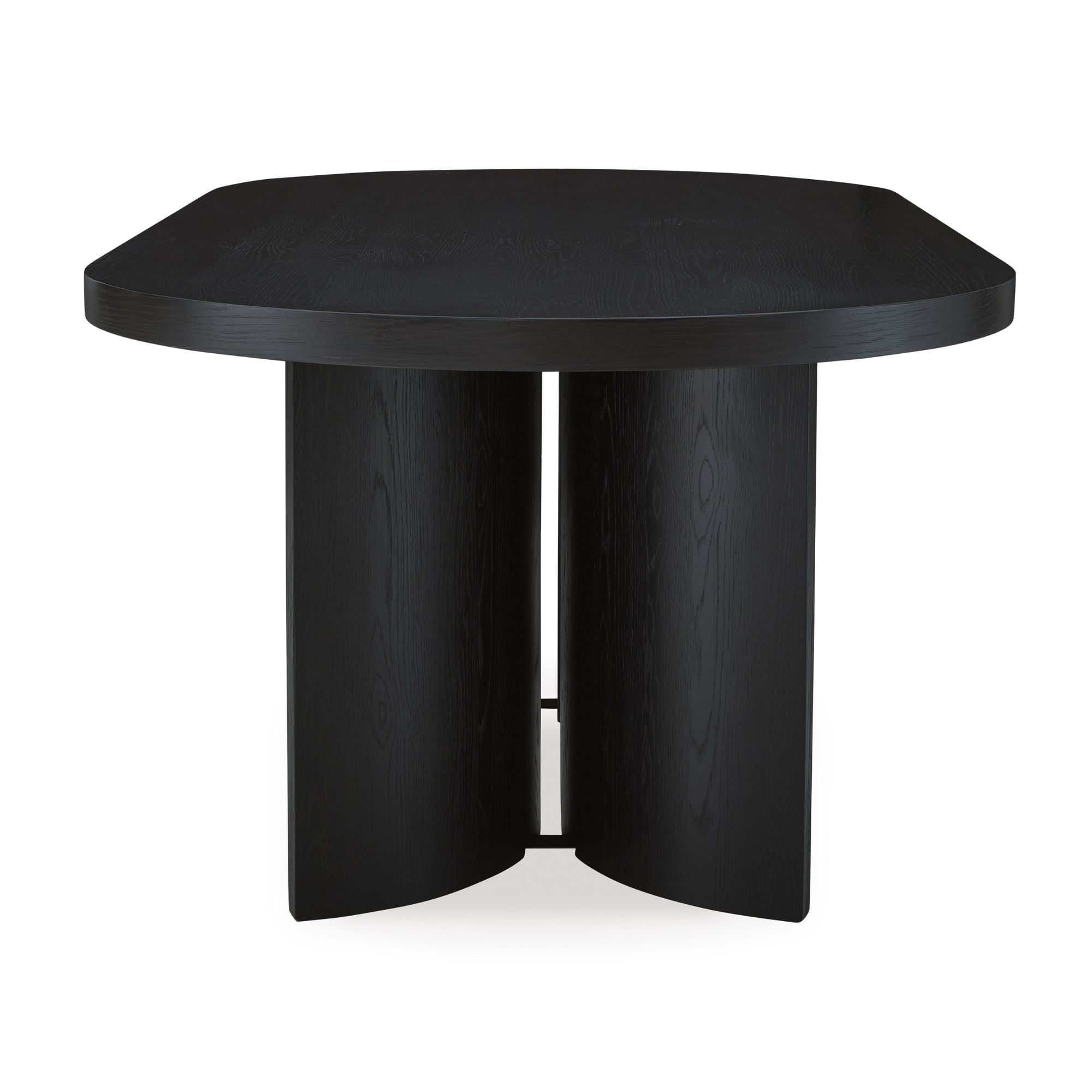 Signature Ashley Rowanbeck Oval Dining Table with a polished wooden surface and sturdy legs in a modern dining room setting.