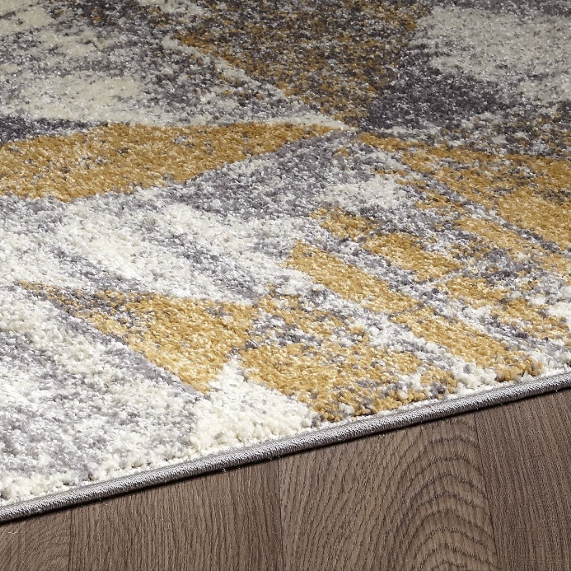 Indoor grey ochre area rug by Viana Inc, featuring a textured design perfect for living rooms or bedrooms.