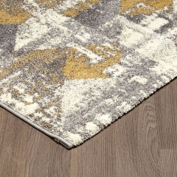 Indoor grey ochre area rug by Viana Inc featuring a soft, textured design suitable for living rooms and bedrooms.