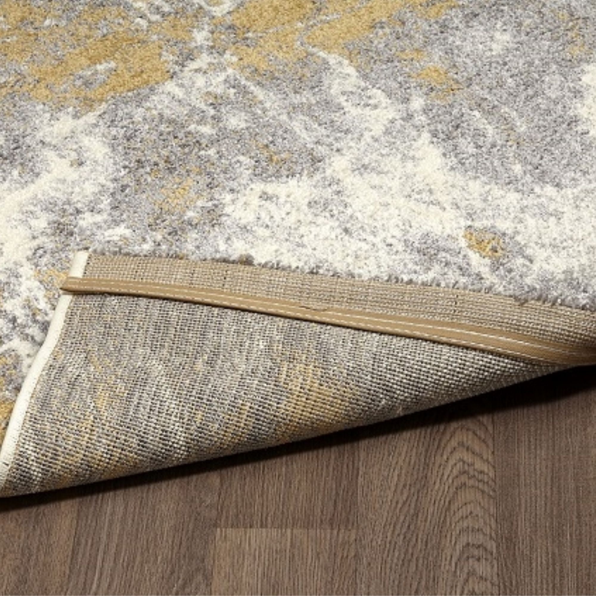 White ochre indoor area rug by Viana Inc, featuring a soft textured design perfect for living rooms and bedrooms.