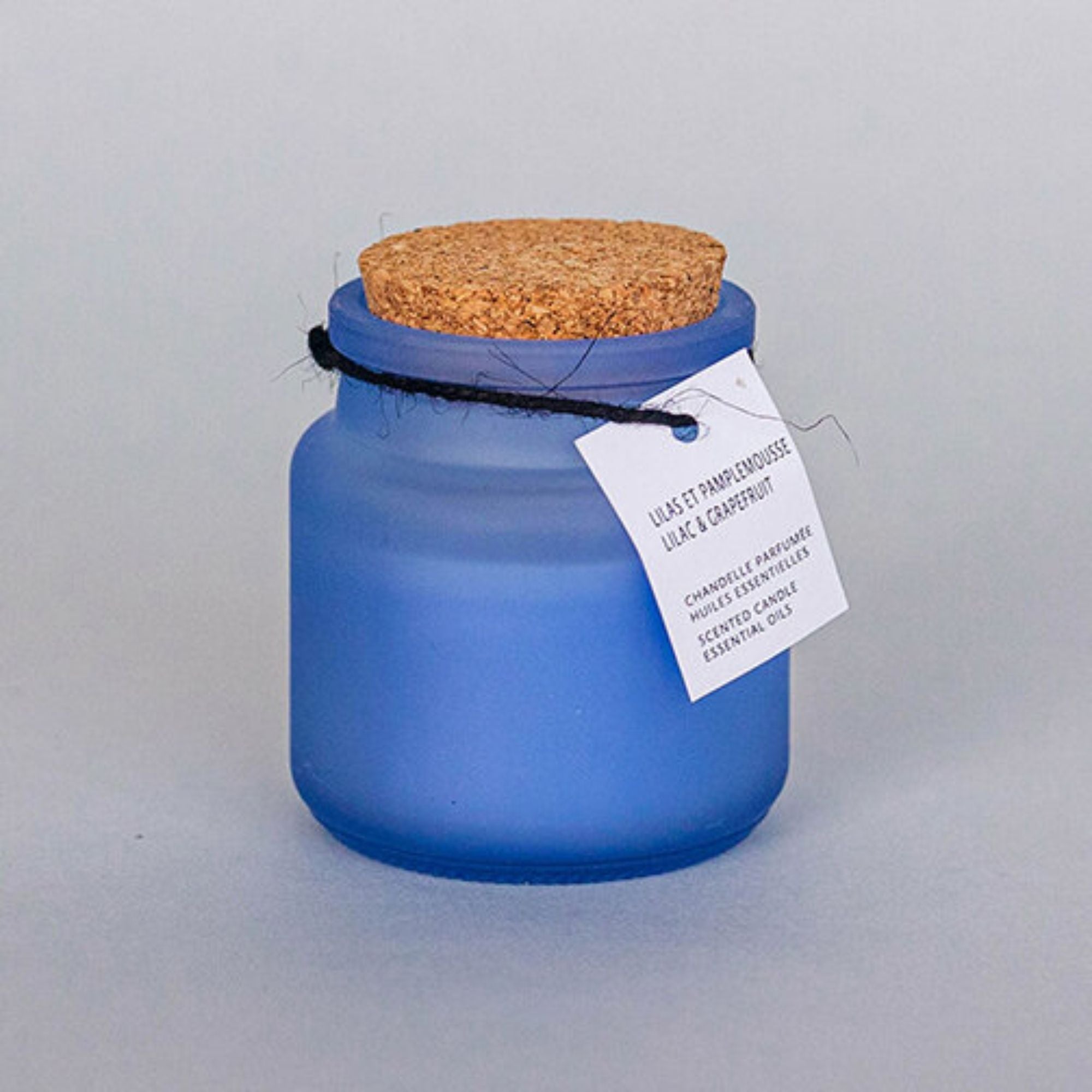 F&T Lilac & Grapefruit scented candle in a blue jar with cork lid