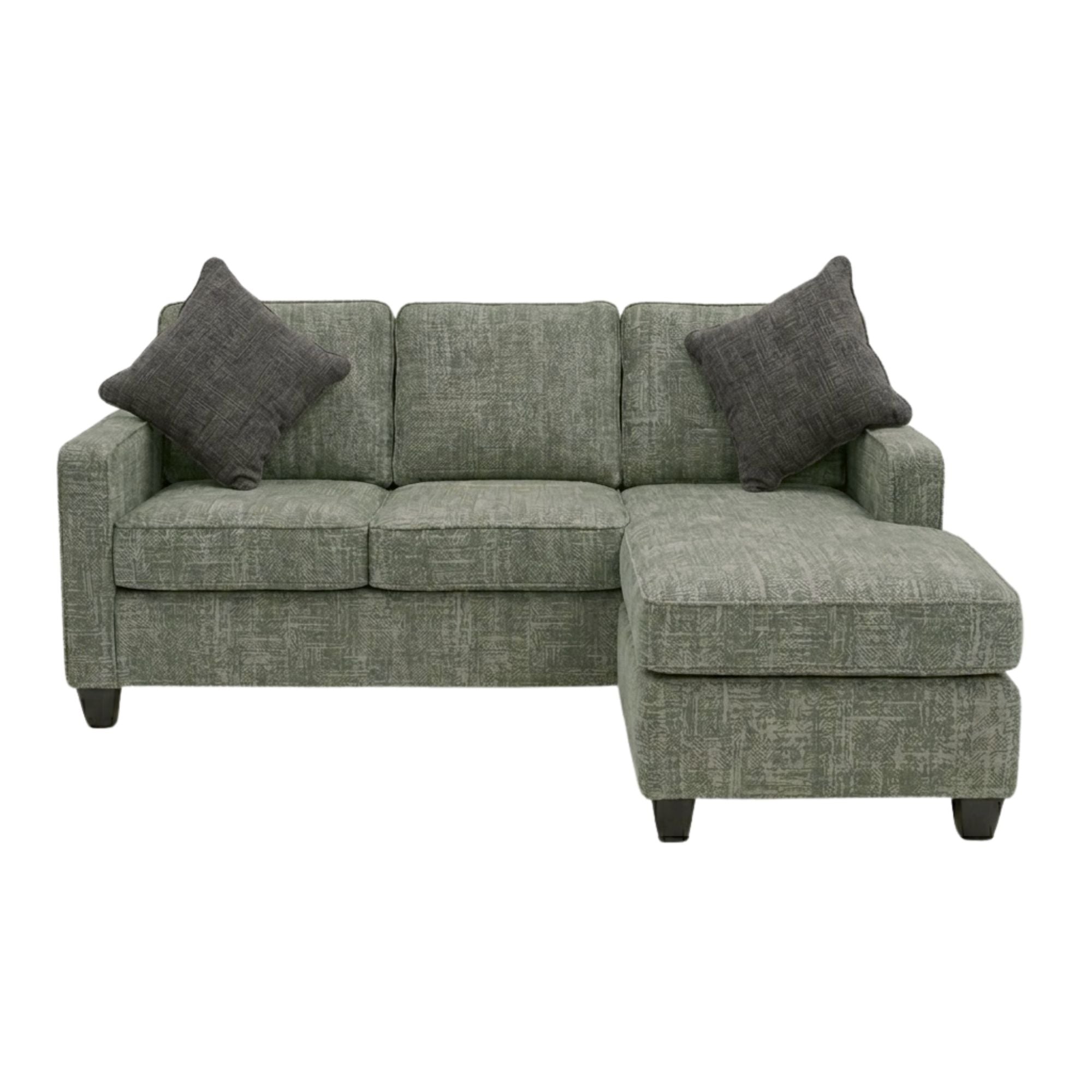 A.C. Canadian-made reversible sectional sofa with chaise and ottoman in green and grey fabric, showing its modern design and plush cushions.