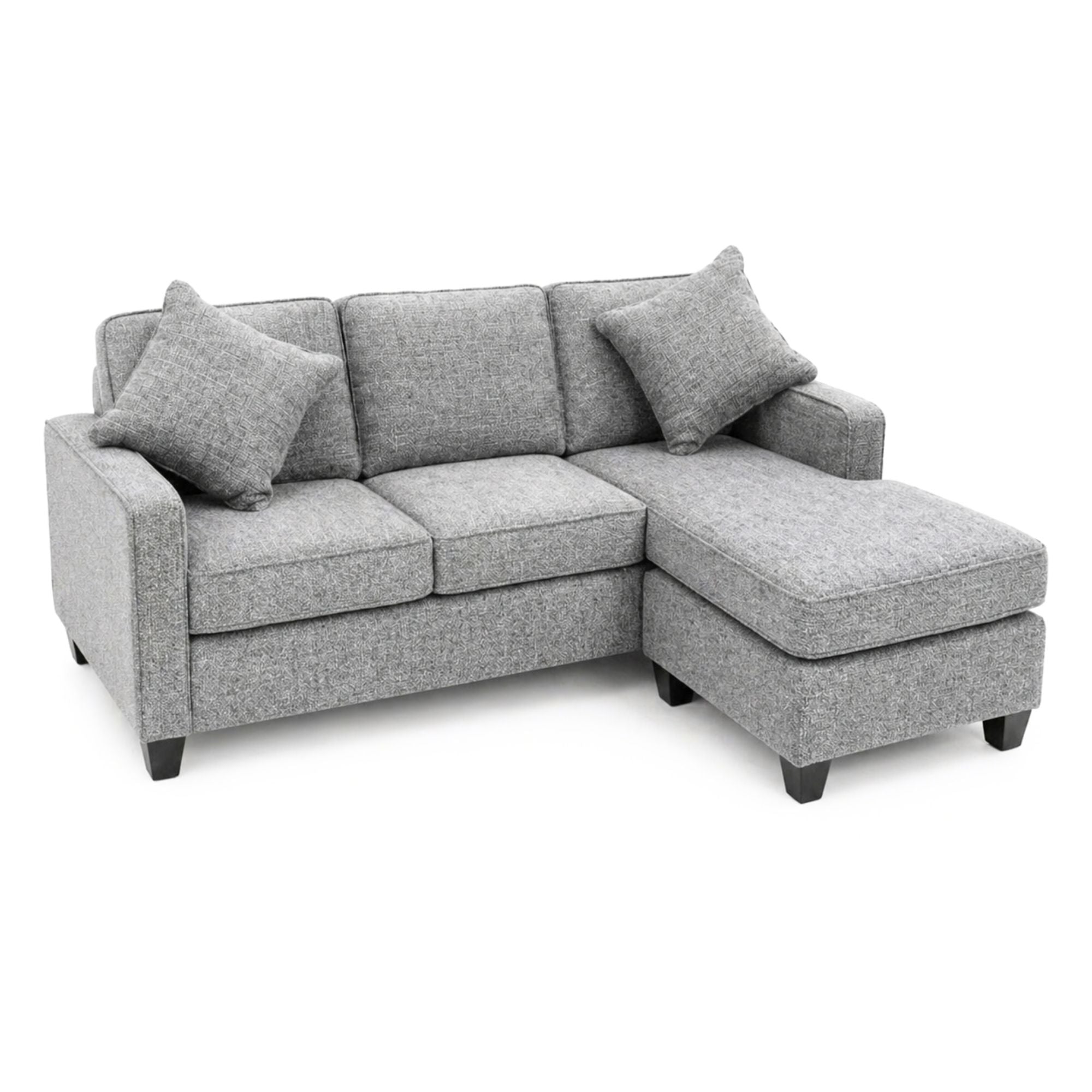 Canadian made reversible sectional sofa with chaise and ottoman in snow grey, stylish and comfortable for modern living spaces.
