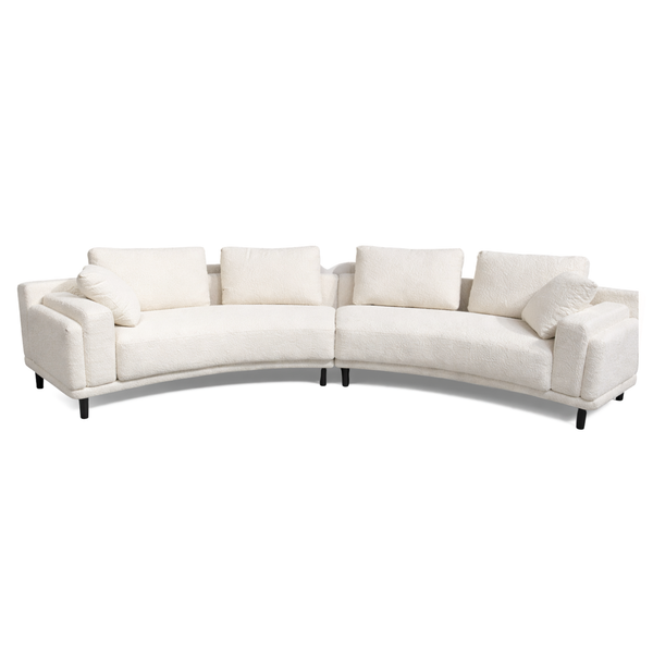 Brassex Antonio beige curved sectional sofa with plush cushions and modern design, perfect for contemporary living rooms.