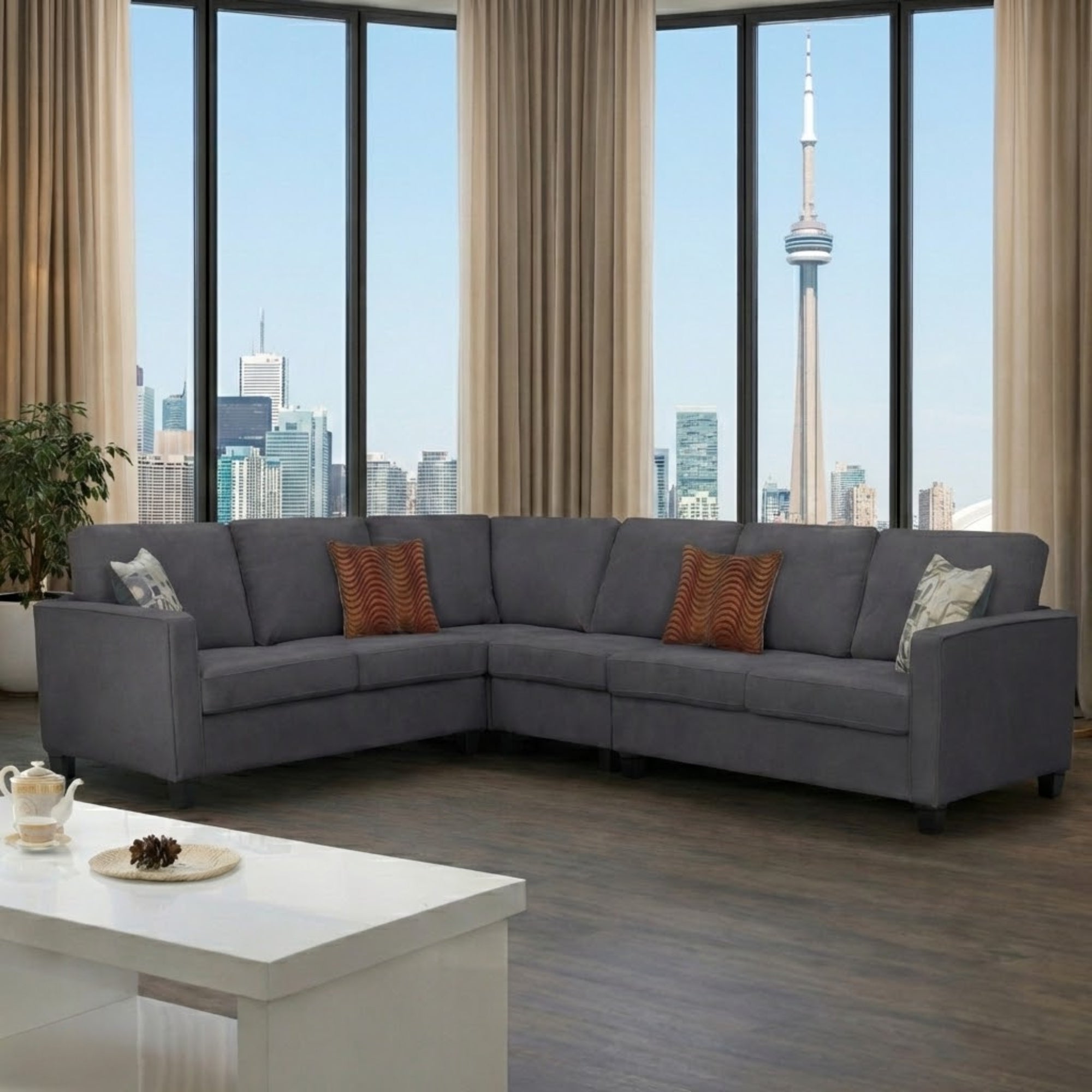 Reversible grey sectional sofa by T.T.F with plush cushions and modern design, perfect for contemporary living rooms.