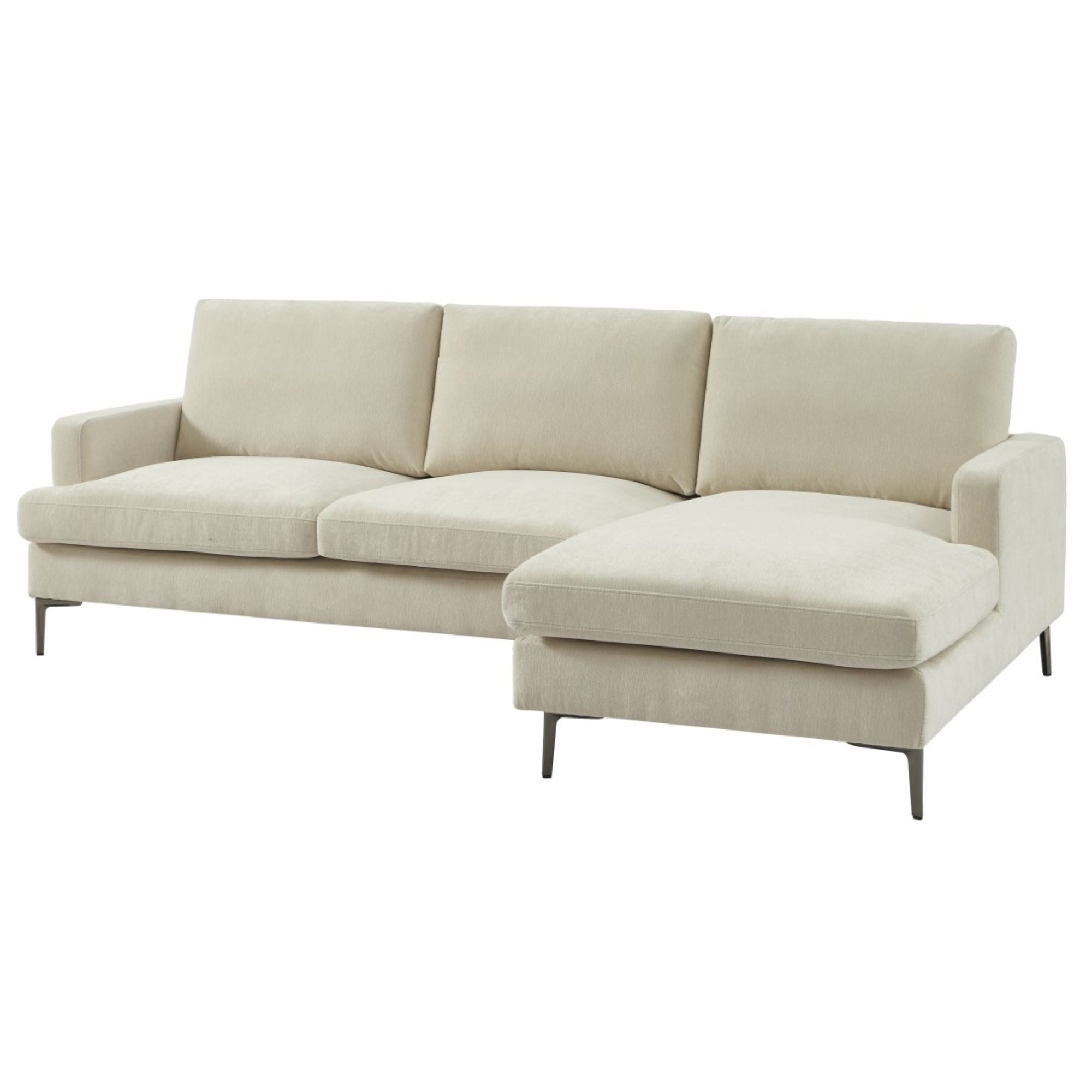 Beige Brassex sectional sofa with plush cushions and modern design, shown in a spacious living room setting.