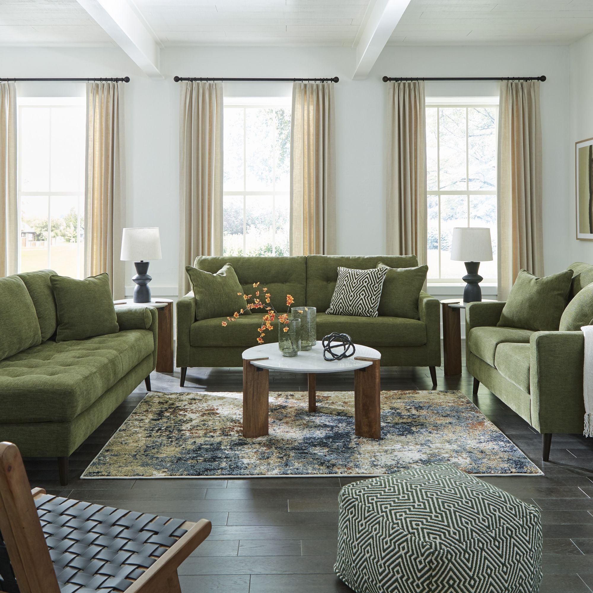 Olive green Bixler sofa set by Signature Design Ashley with plush cushions and modern design, shown in a stylish living room setting.