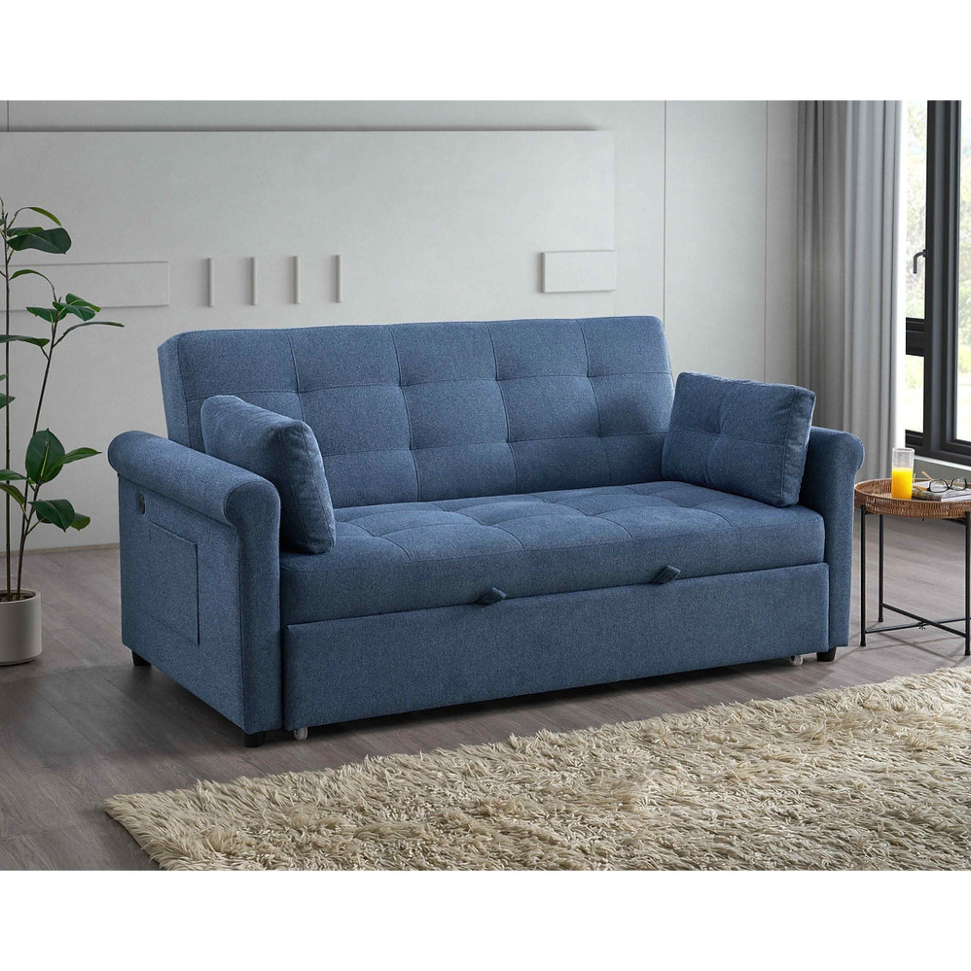 Blue Arlo sofa bed by IFF, showcasing its sectional design and convertible sleeper feature in a modern living room setting.