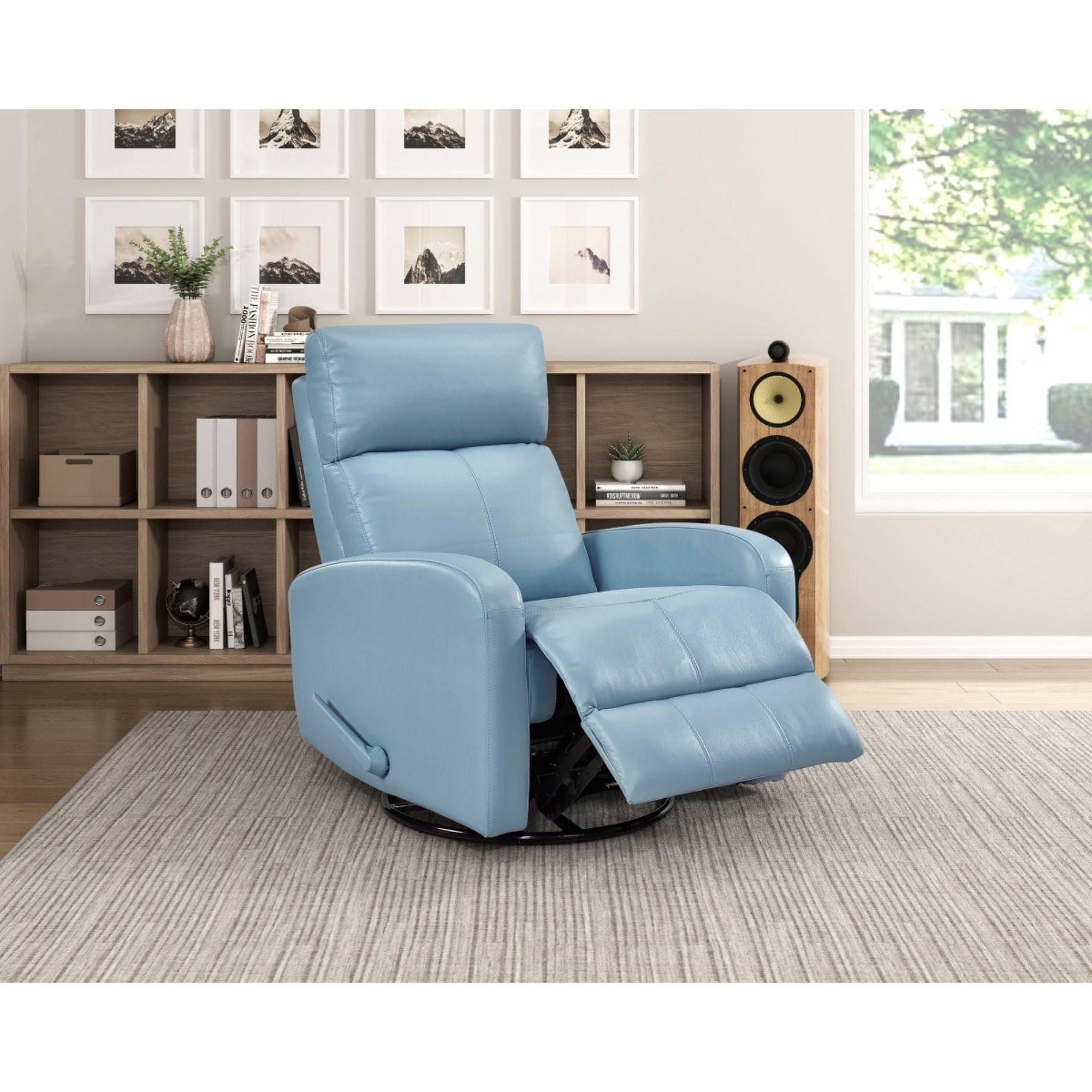 Blue MAZ Sorrento Collection swivel recliner chair with glider and swivel features, shown in a cozy living room setting
