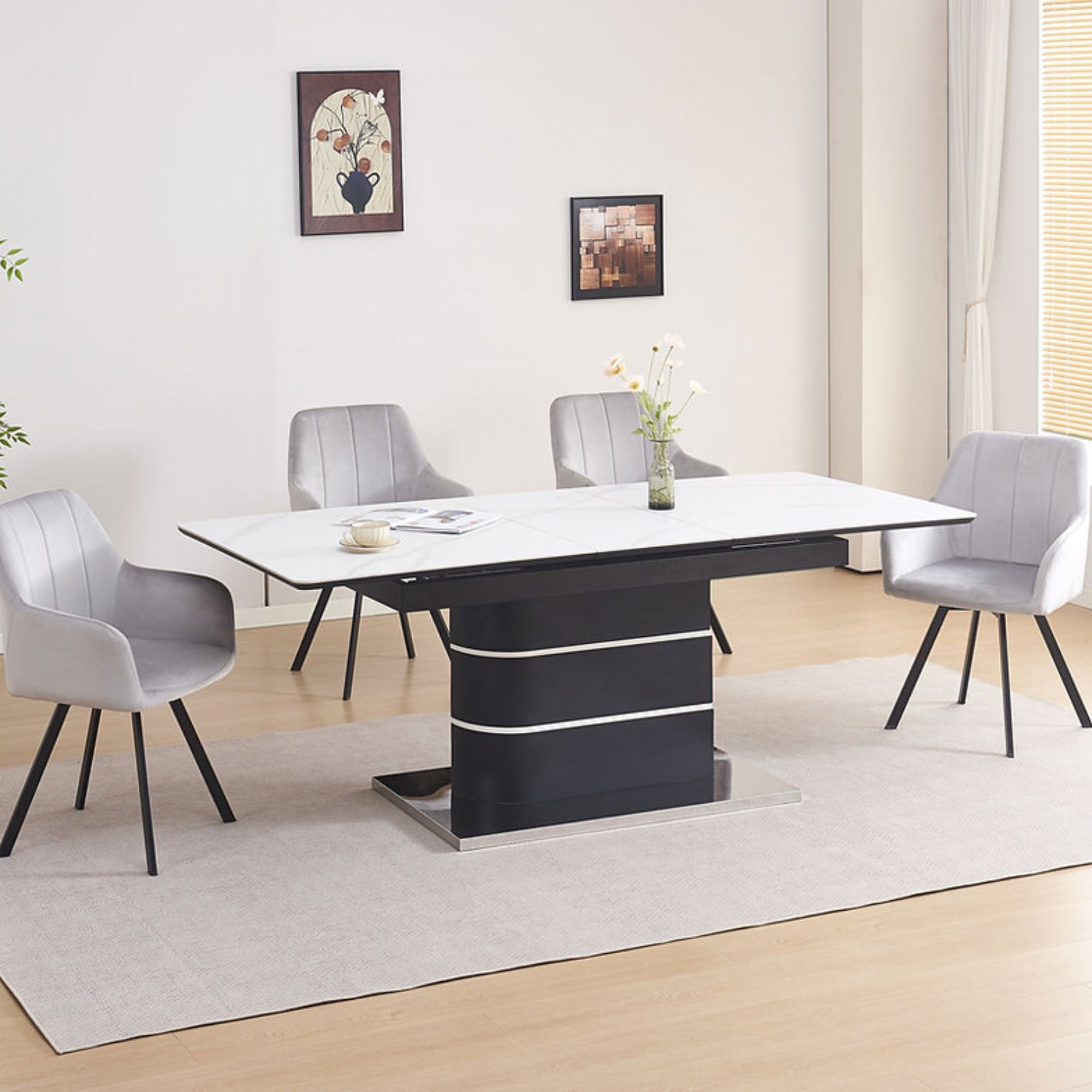 Sintered stone extendable white dining table by IFF, showcasing a sleek modern design with a smooth surface and extendable feature.