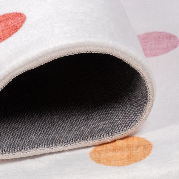 Colorful modern indoor area rug with dotted pattern by Viana Inc, suitable for kids' rooms or play areas.