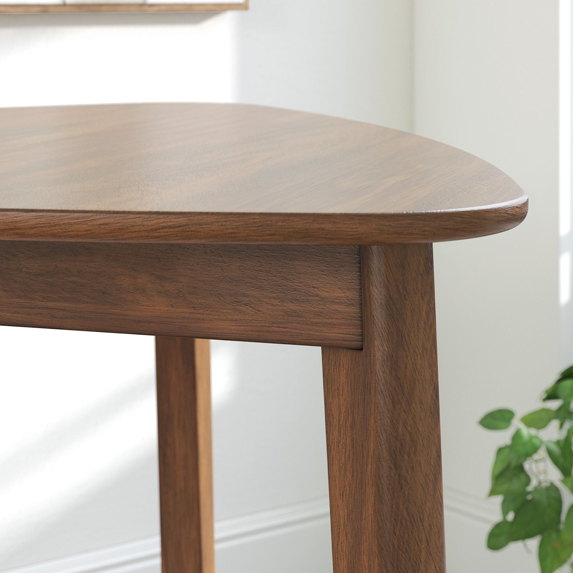 Brown Tameride 5-piece dining room set by Signature Ashley featuring a table and matching chairs in a modern design.