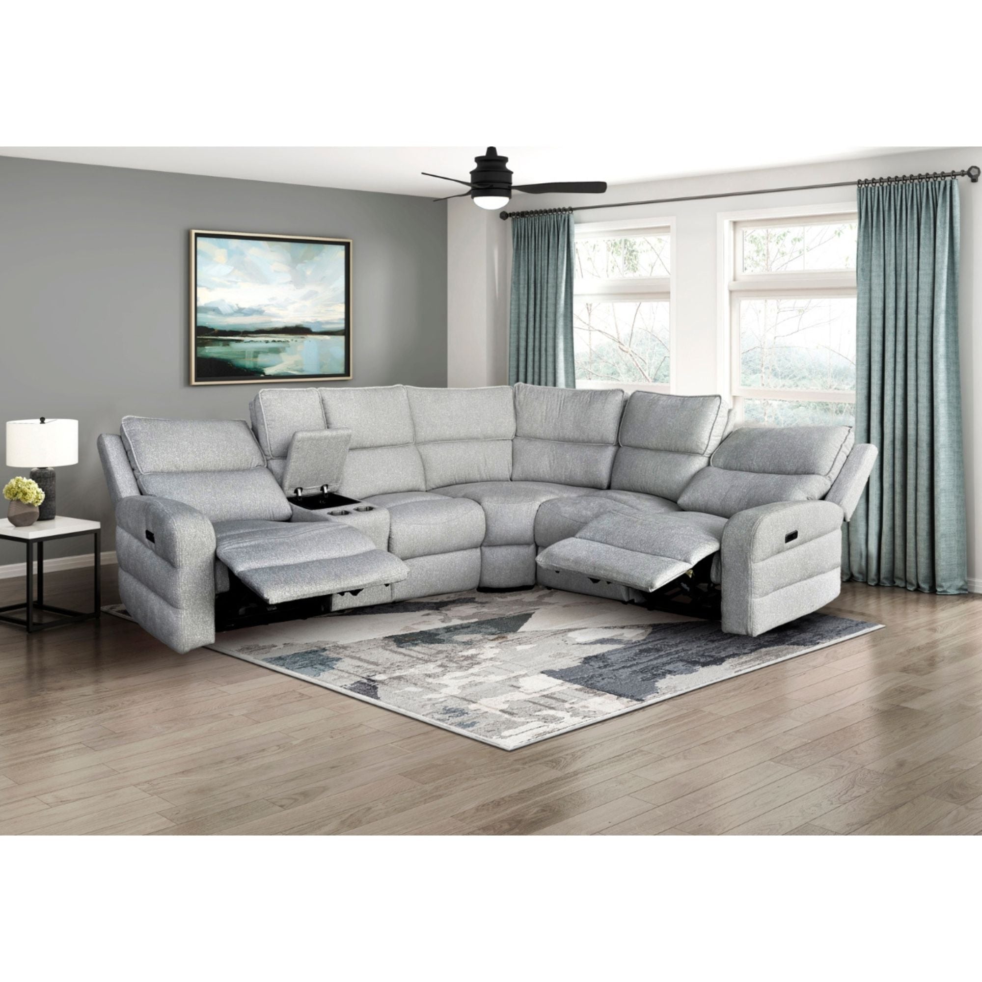 Grey L-shaped sectional sofa from the Thorne II Collection by MAZ, featuring plush cushions and modern design.