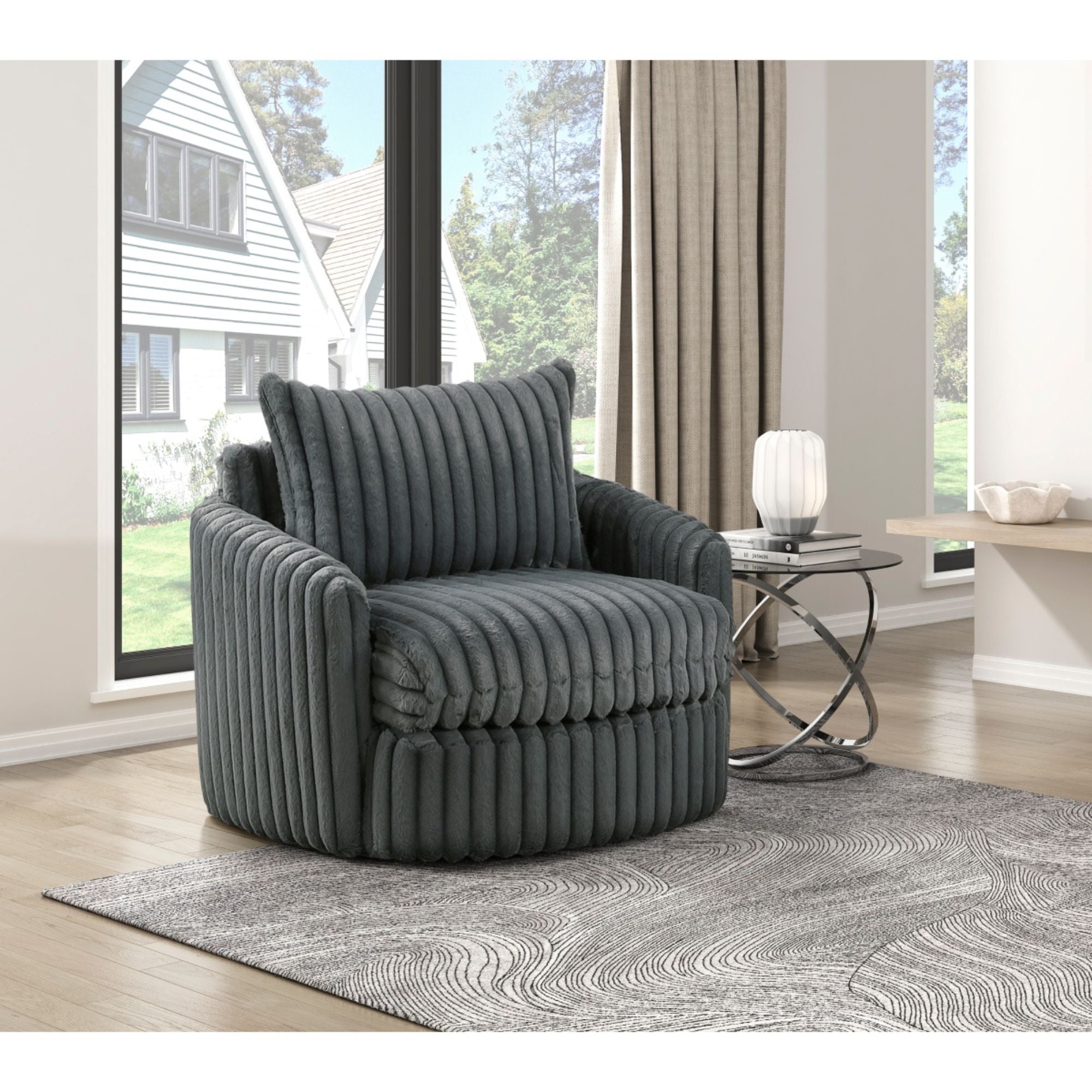 Dark grey Tomball accent chair by M.A.F with plush fabric and modern design, shown in a stylish living room setting.