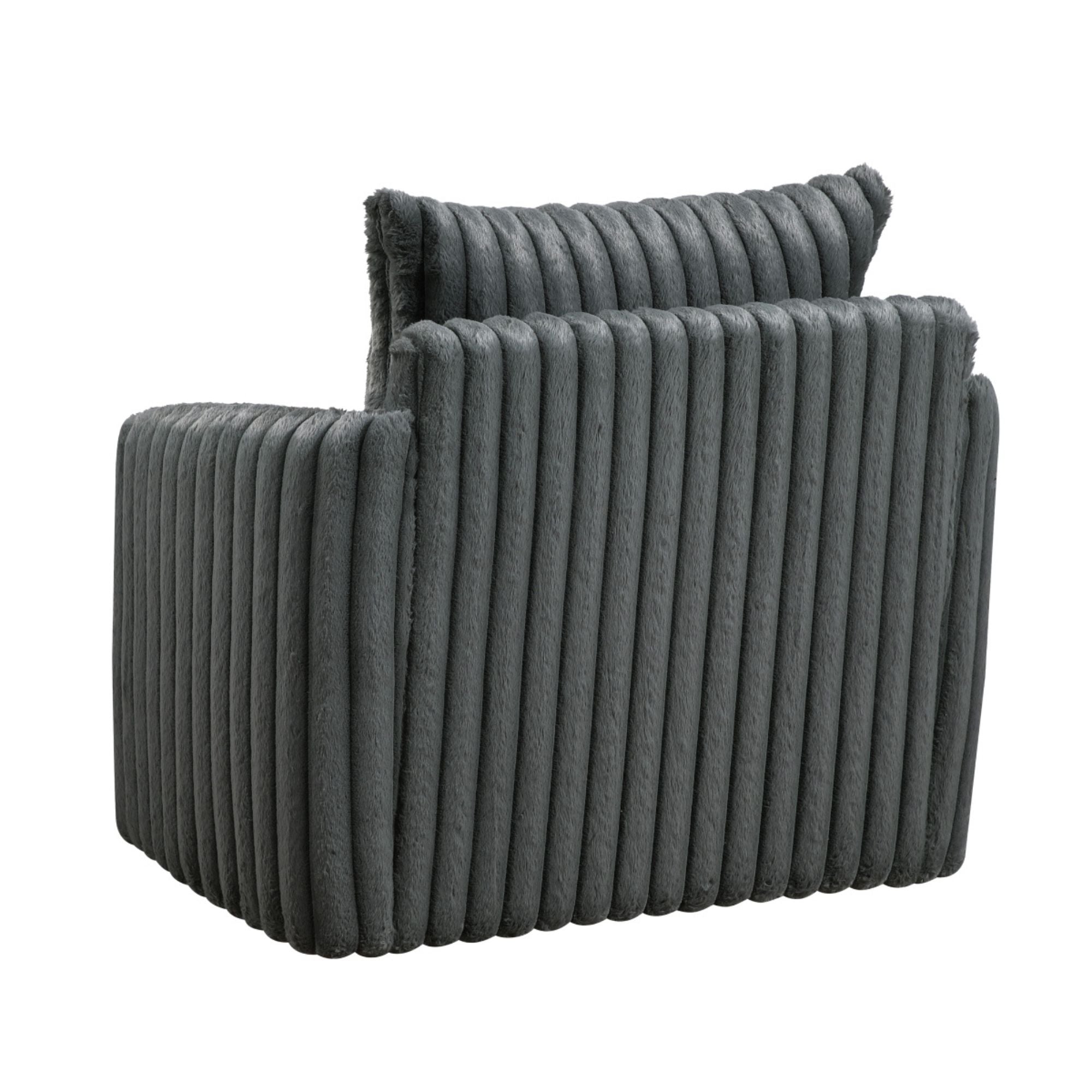 Dark grey Tomball Accent Chair by M.A.F with plush fabric and modern design, shown from a side angle in a cozy living room setting.
