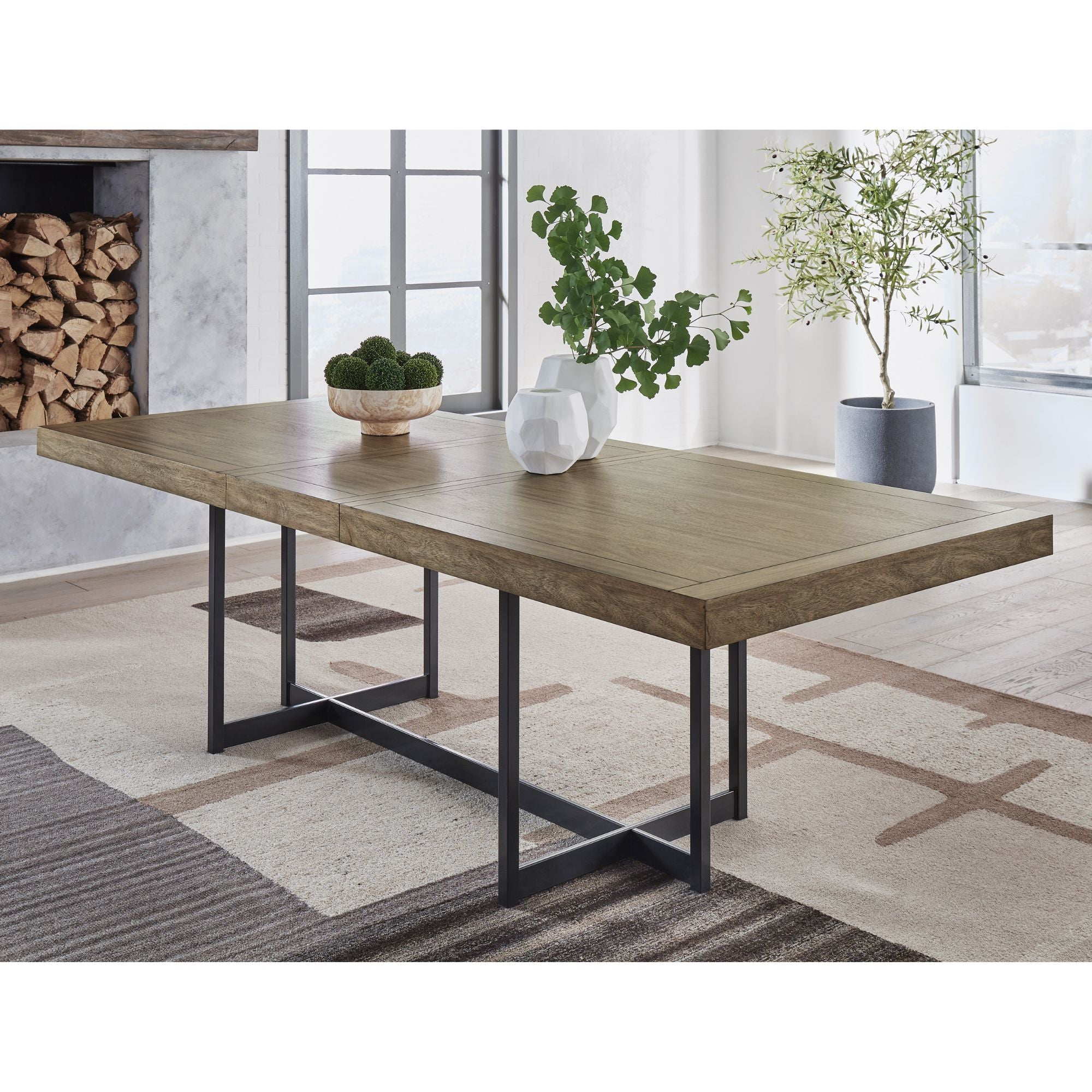 Signature Ashley Tomtyn extendable dining table with wooden finish, showcasing a spacious surface and sturdy legs in a modern dining room setting.