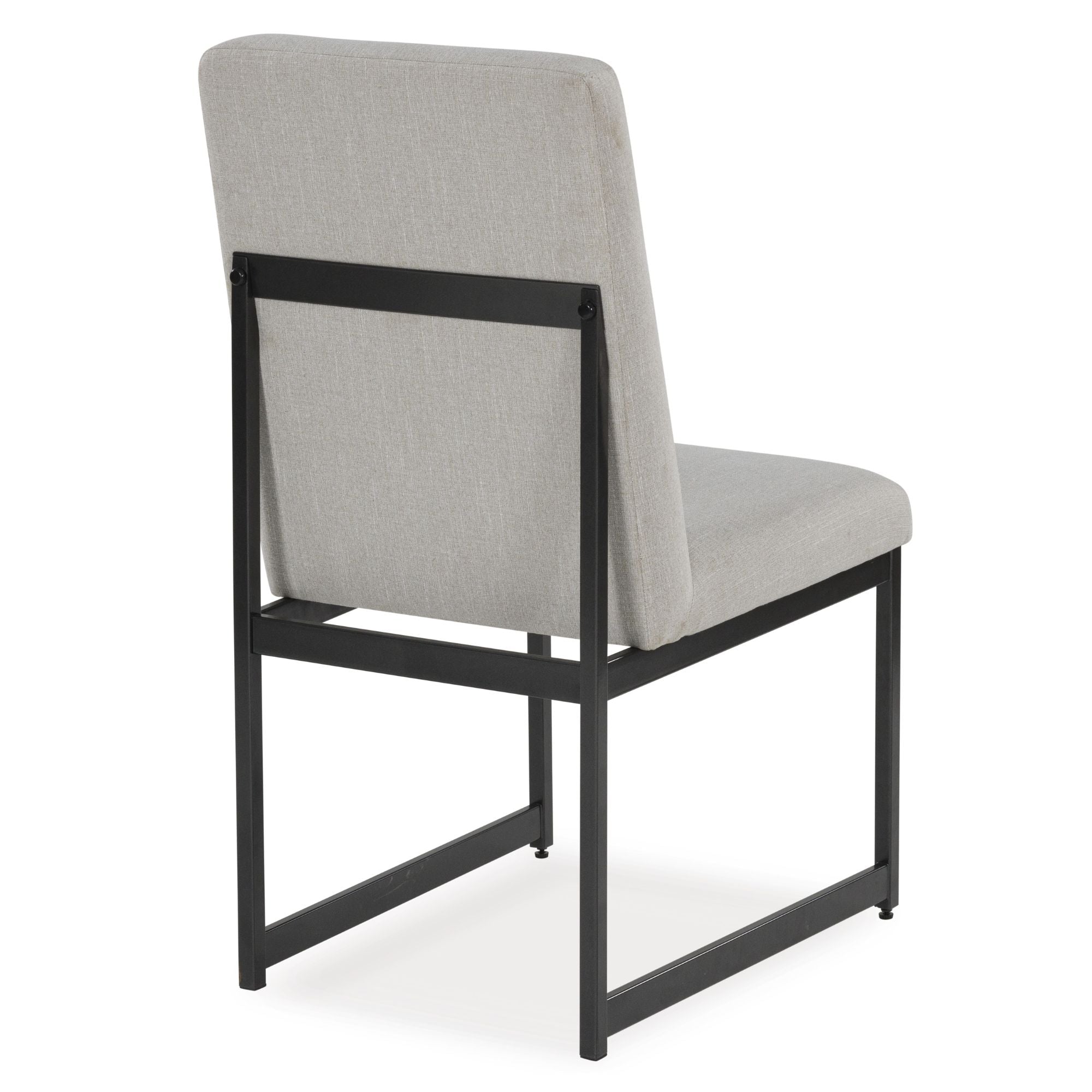 Grey Tomtyn dining room set by Signature Ashley featuring a modern table and matching chairs in a contemporary dining space.