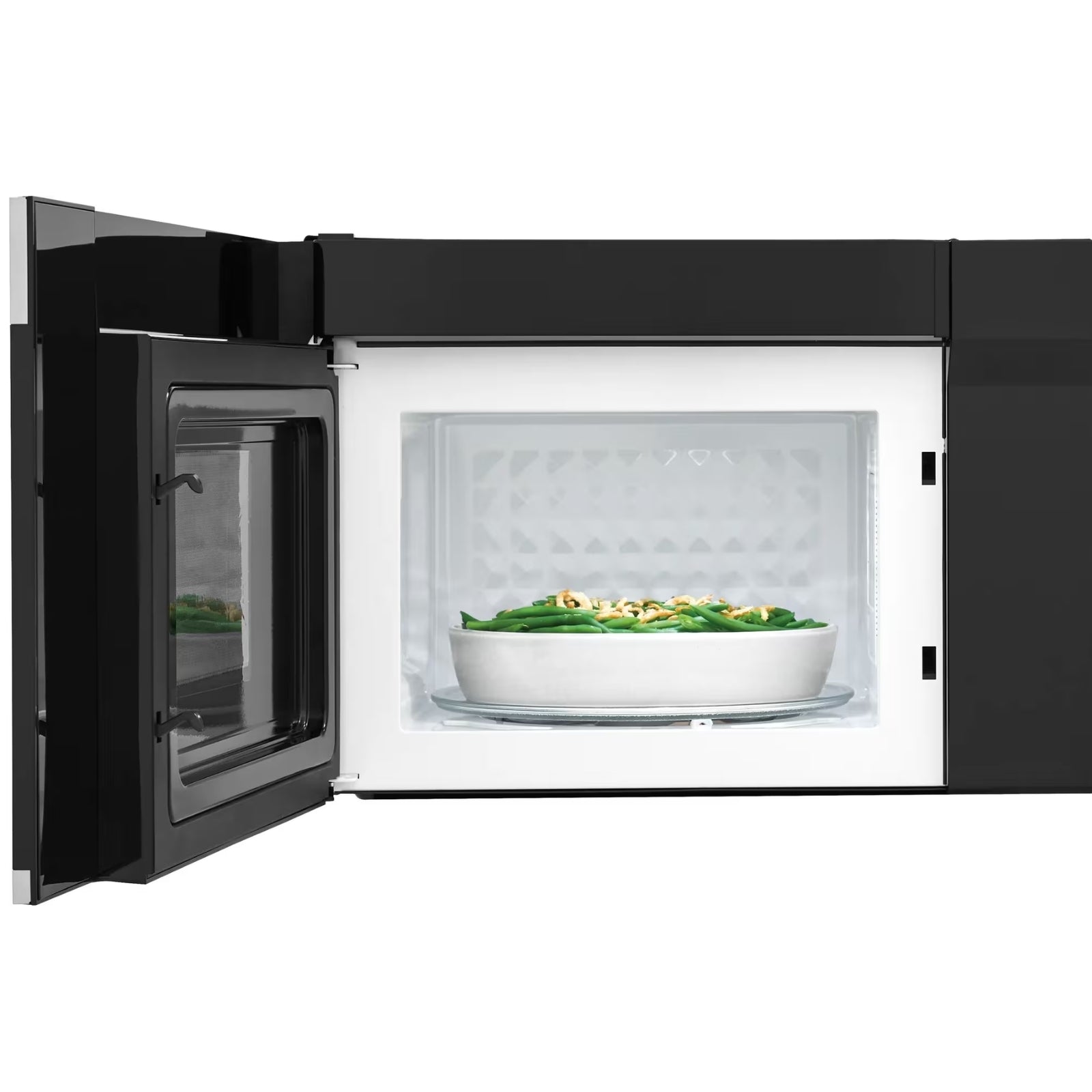 Frigidaire UMV1422US stainless steel over-the-range microwave with digital display and control panel inside the oven.