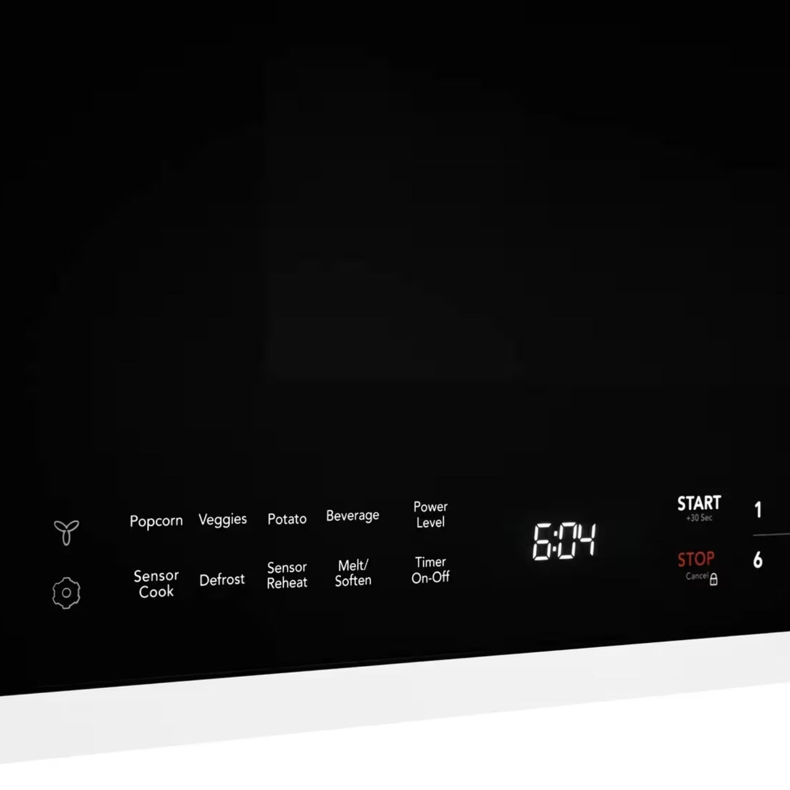 White Frigidaire UMV1422UW over-the-range microwave with digital control panel and spacious interior, ideal for kitchen cooking needs.