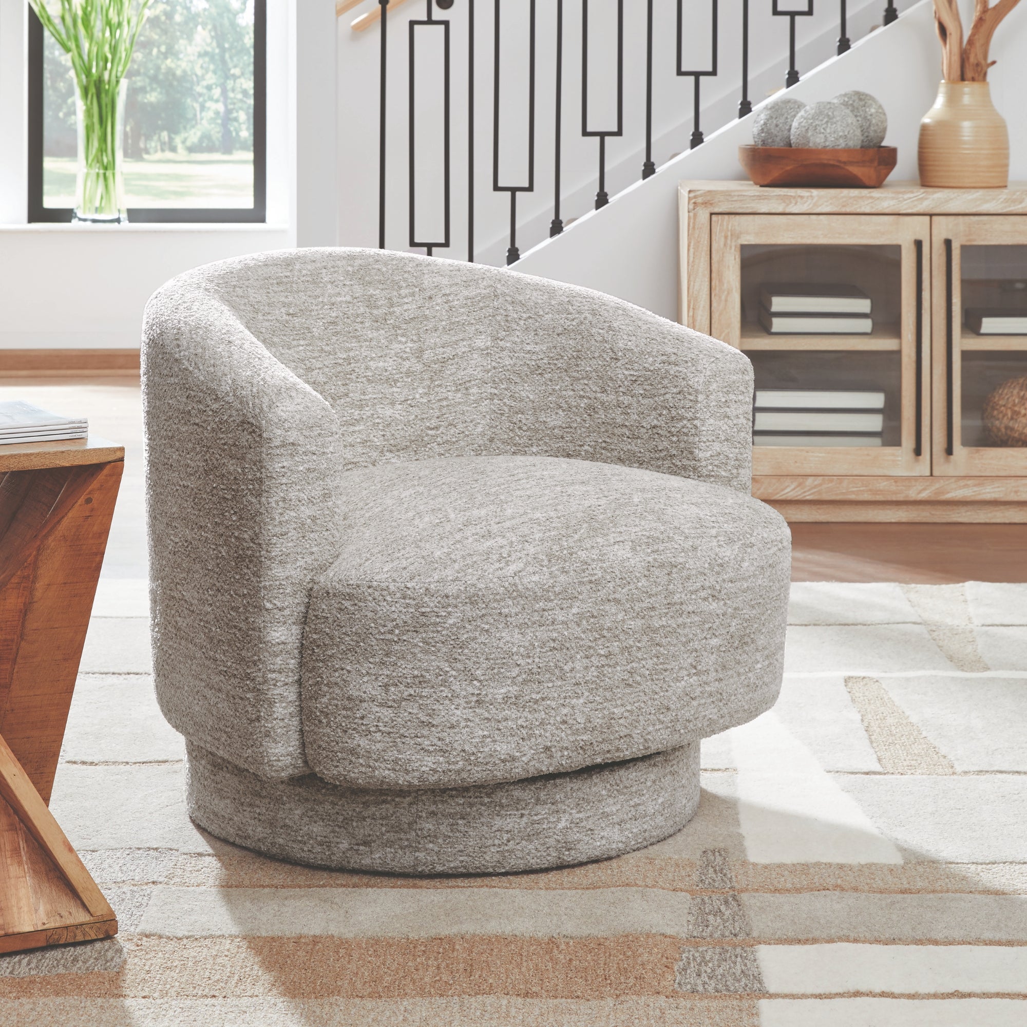 Wardsor Swivel Accent Chair in Stone