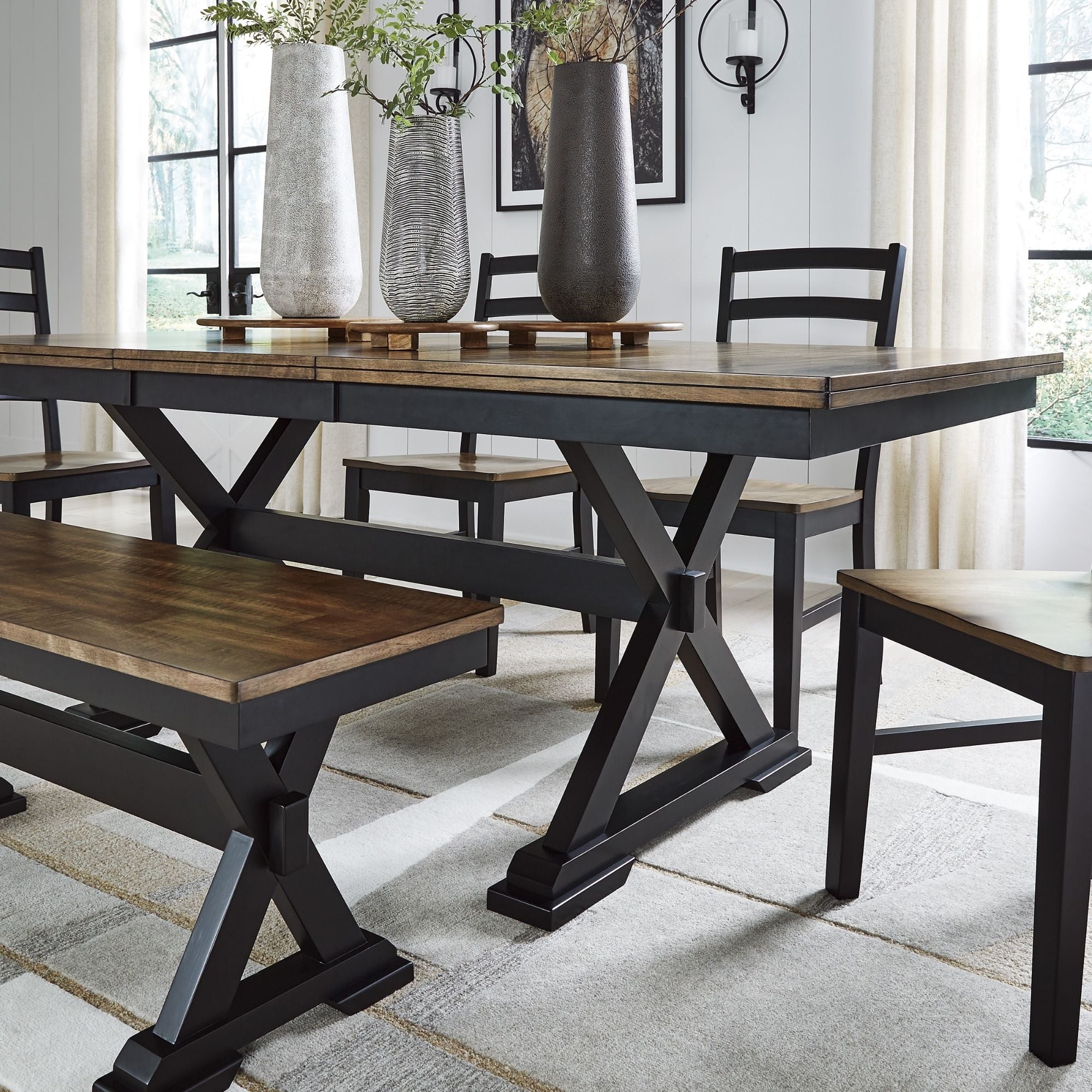 Wildenauer dining room set with table, chairs, and bench by Ashley, showcasing wooden furniture for a stylish dining area.
