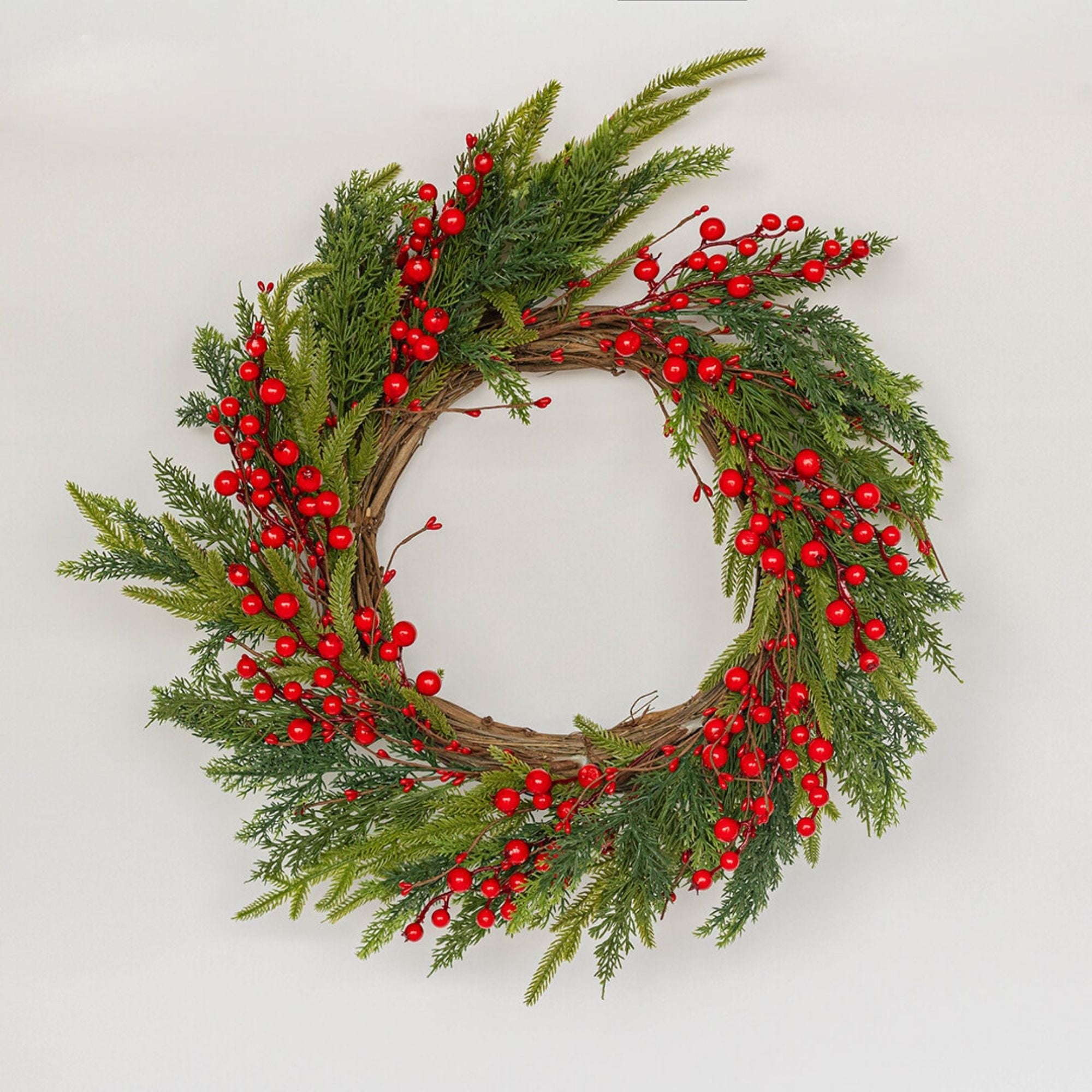 16-inch F&T Christmas wreath with red berries, green foliage, and decorative holiday design
