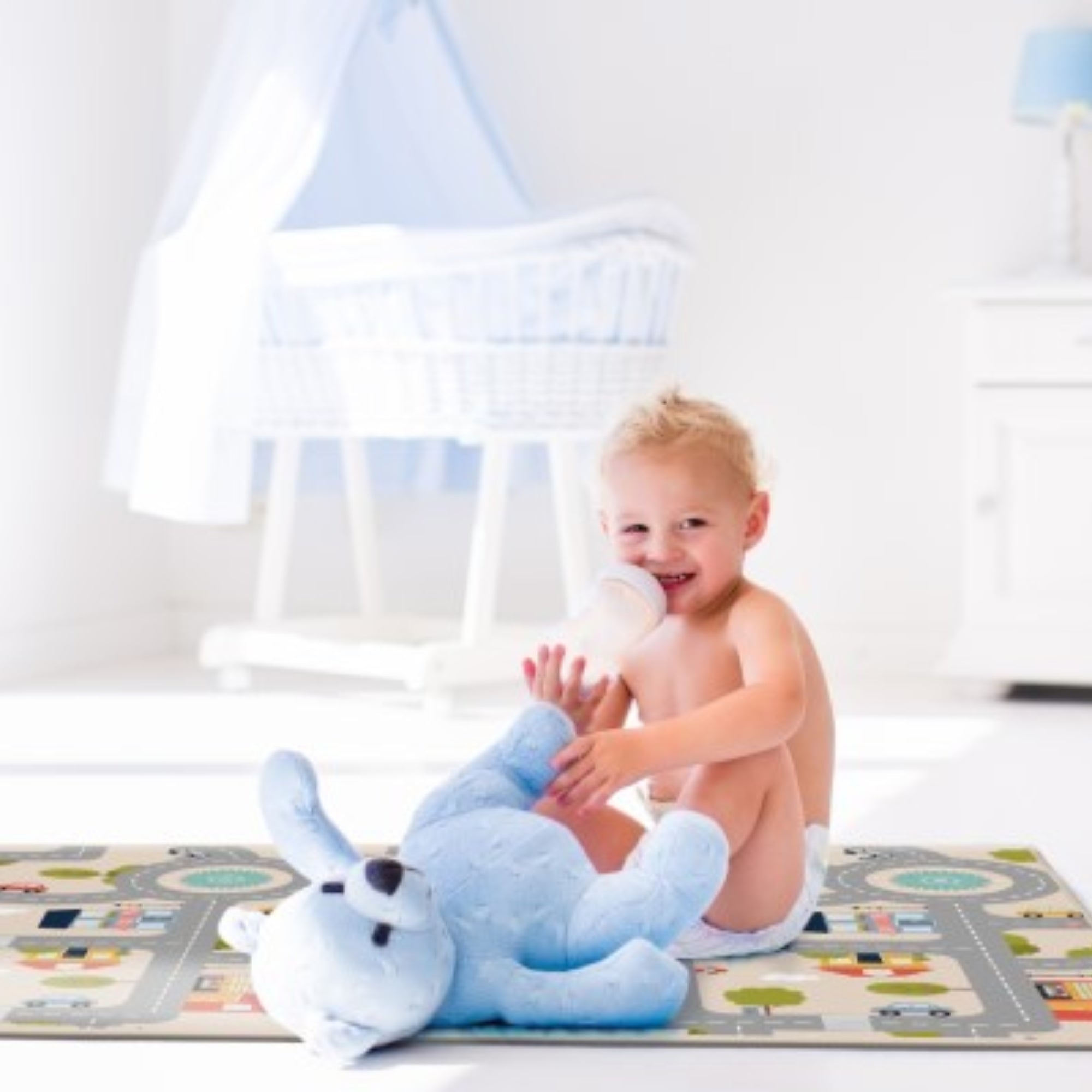 Reversible waterproof baby playmat from Yokina Farm City by Viana Inc, featuring colorful farm and city designs for infants.