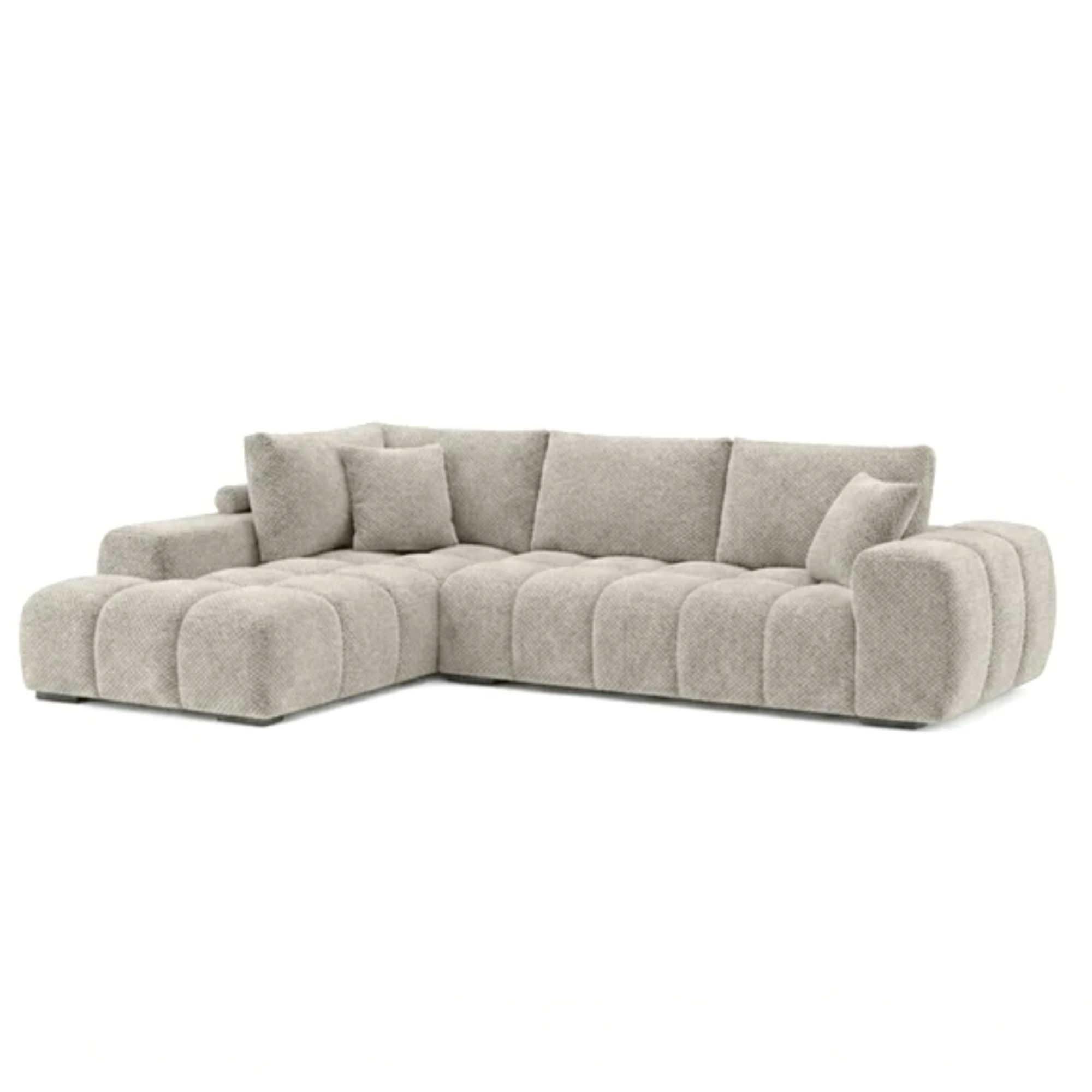 Brassex Zara sectional sofa in light grey fabric, featuring a modern L-shaped design with plush cushions and sleek armrests.