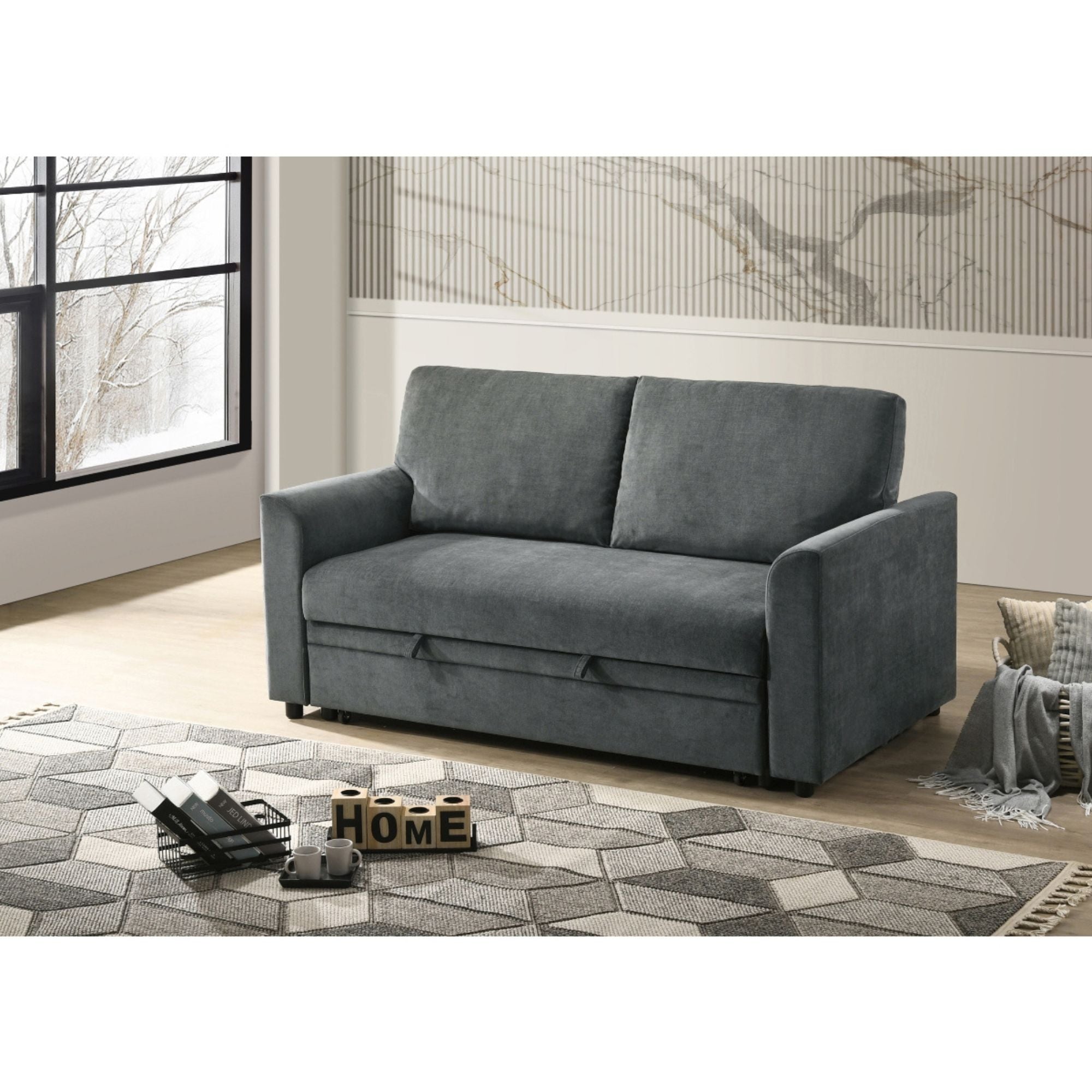 MAZ Zoya grey sofa bed with folded mattress and modern design, showcasing its convertible sofa sleeper feature.