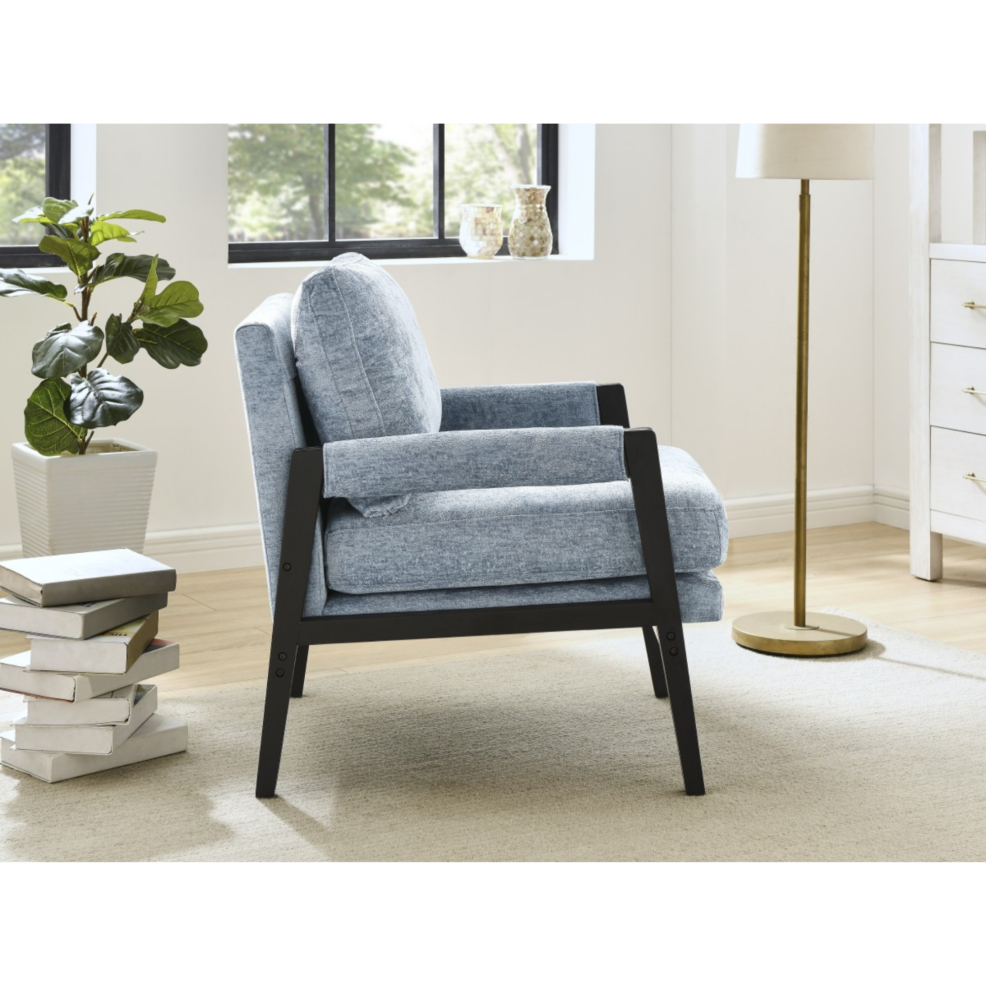 Blue fabric accent arm chair by Brassex with a modern design, featuring comfortable cushioning and stylish wooden legs.