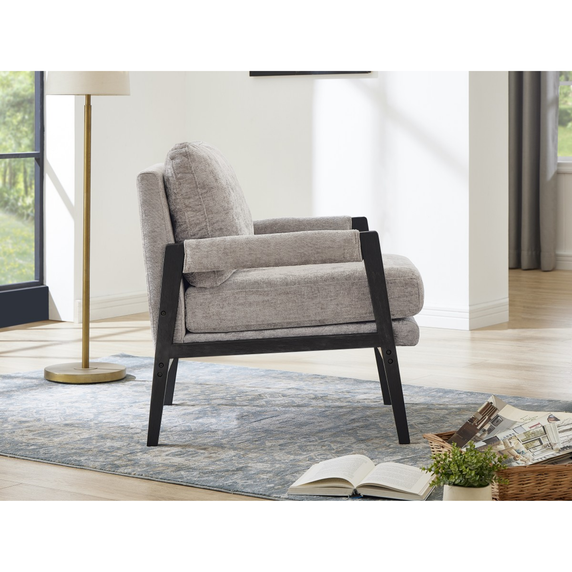 Grey fabric accent arm chair by Brassex featuring a modern design and cushioned seating for stylish comfort.