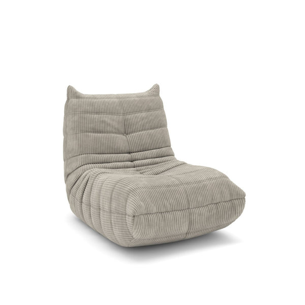 Beige fabric armless accent chair by Brassex, showcasing a modern, minimalist design with clean lines and comfortable seating.