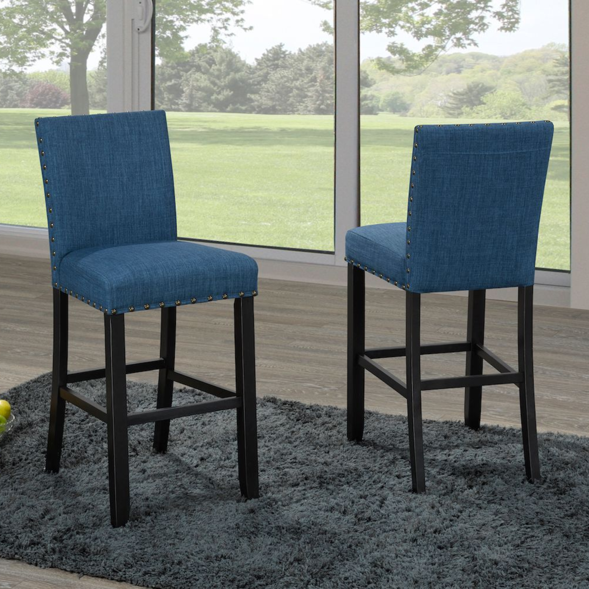 Set of two blue 29-inch Brassex counter bar stools with sleek modern design, perfect for kitchen or bar area seating.