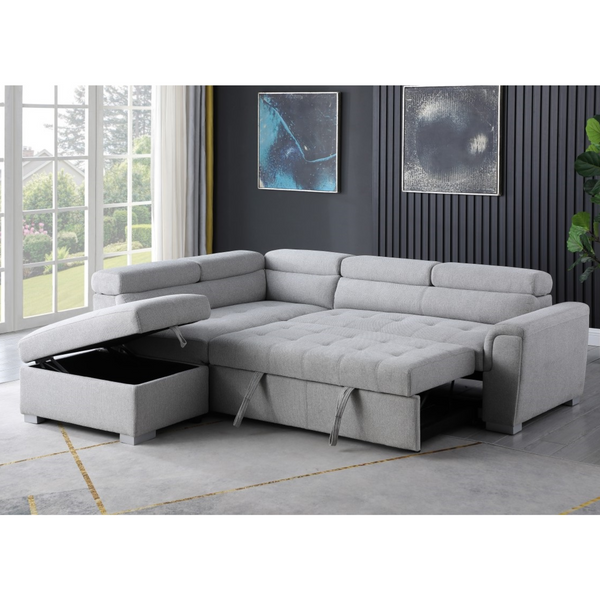 Brassex grey sectional sleeper sofa with bed in a modern living room setting, featuring plush upholstery and a functional design.