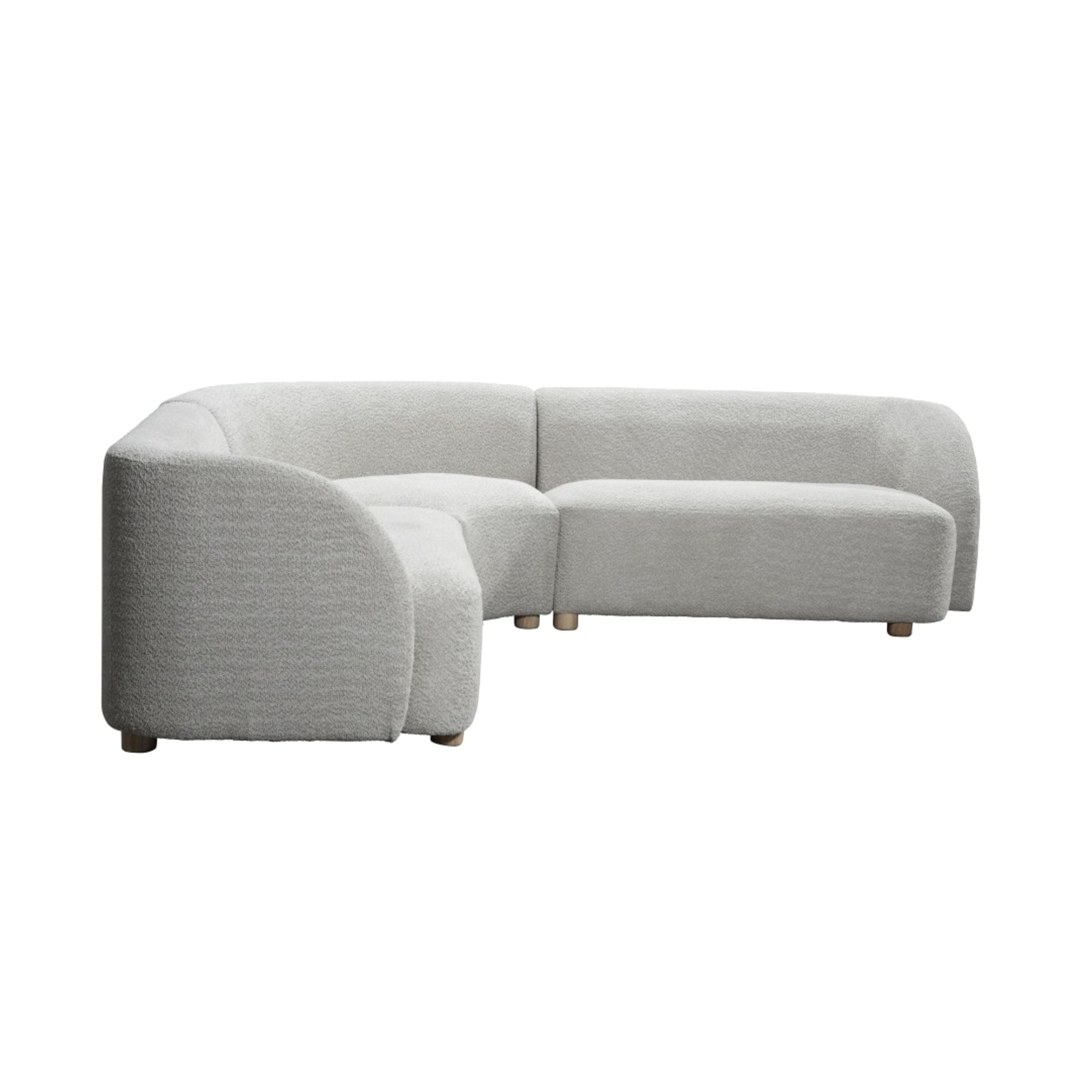 Beige polyester sectional sofa from Brassex, showcasing a spacious, modern design with plush cushions and clean lines.