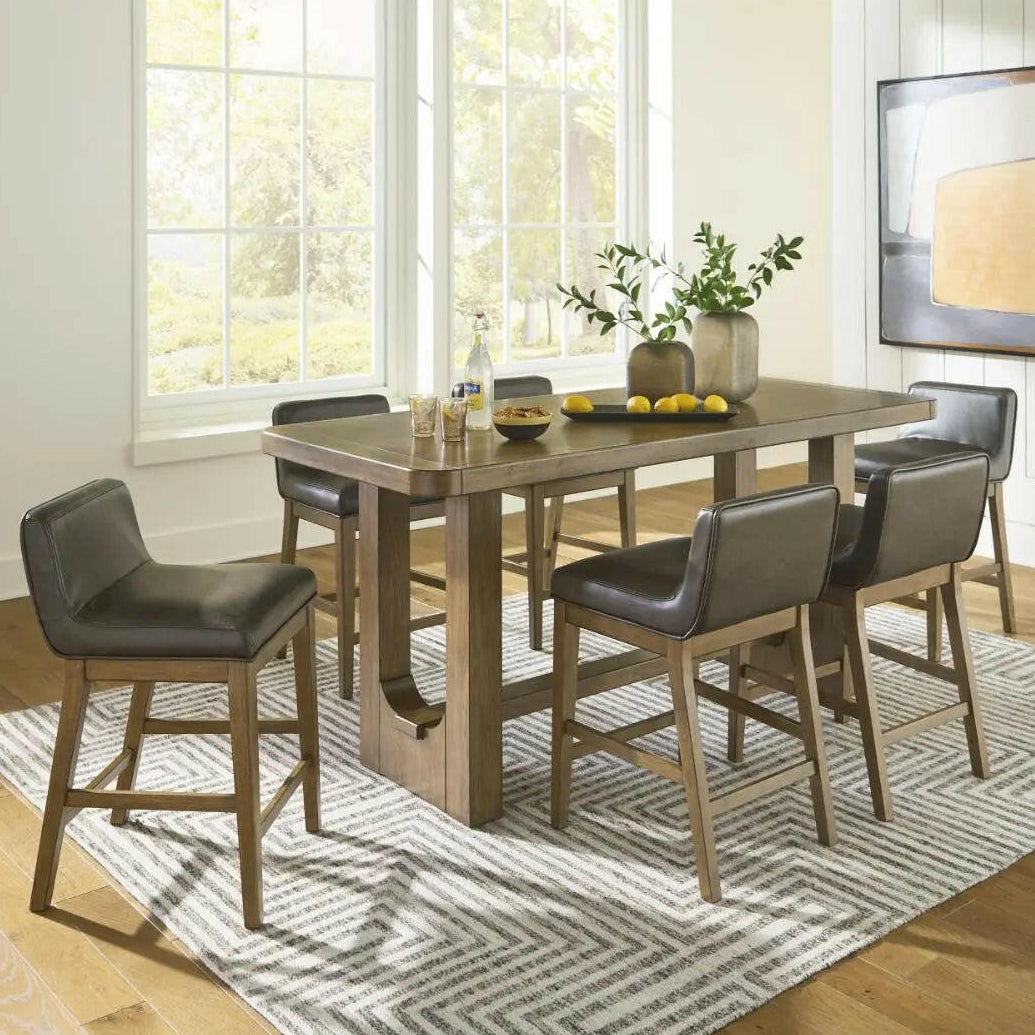 Cabalynn pub dining set in brown with a table and matching chairs, part of Signature Design by Ashley's dining room furniture collection.