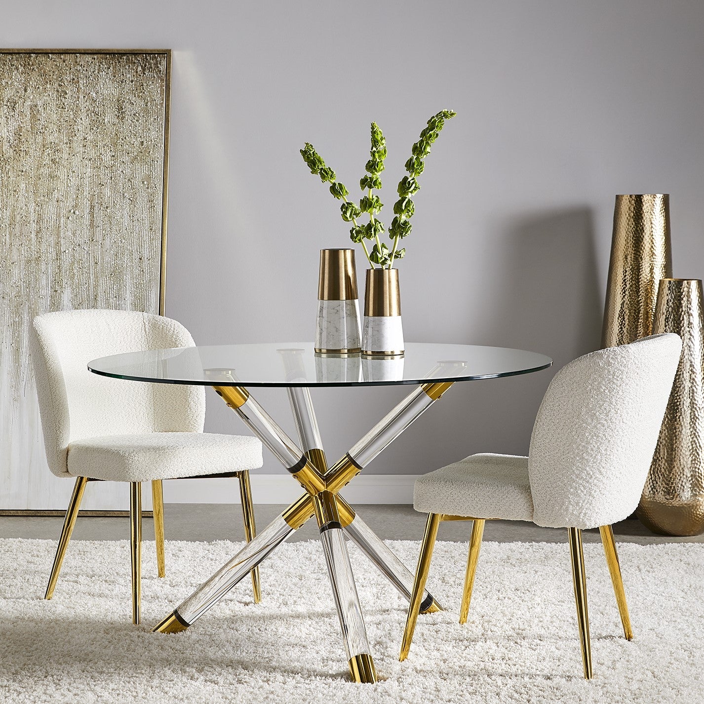 Xcella Paloma dining table from a 5-piece white tempered glass dining set with silver accents and white leather chairs.