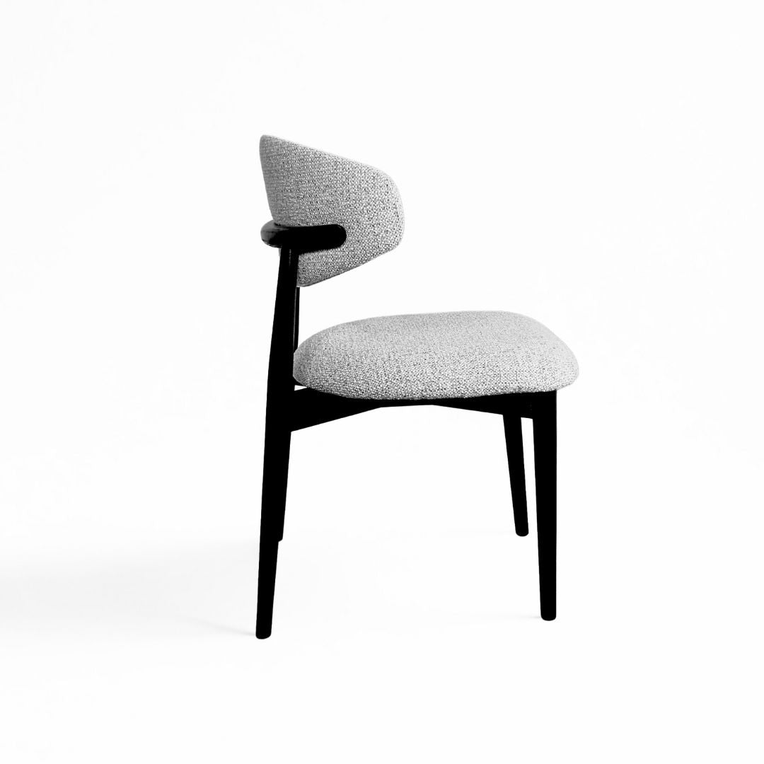 Albin Ella + Ross dining chair with wooden legs and upholstered seat, perfect for kitchen and dining room decor.