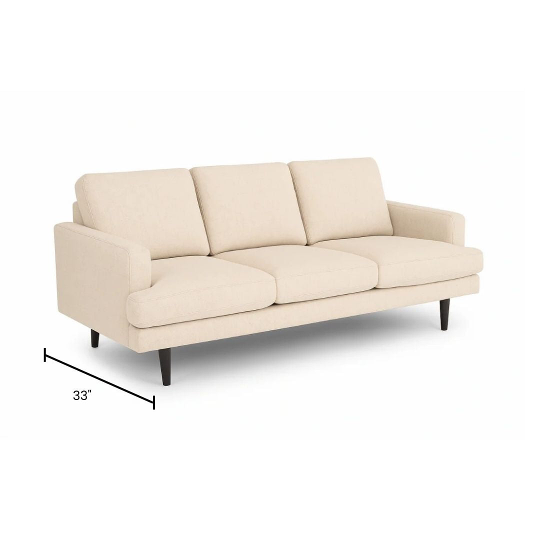 Xcella Wilma Sofa in beige with plush cushions and modern design, perfect for stylish living room seating.